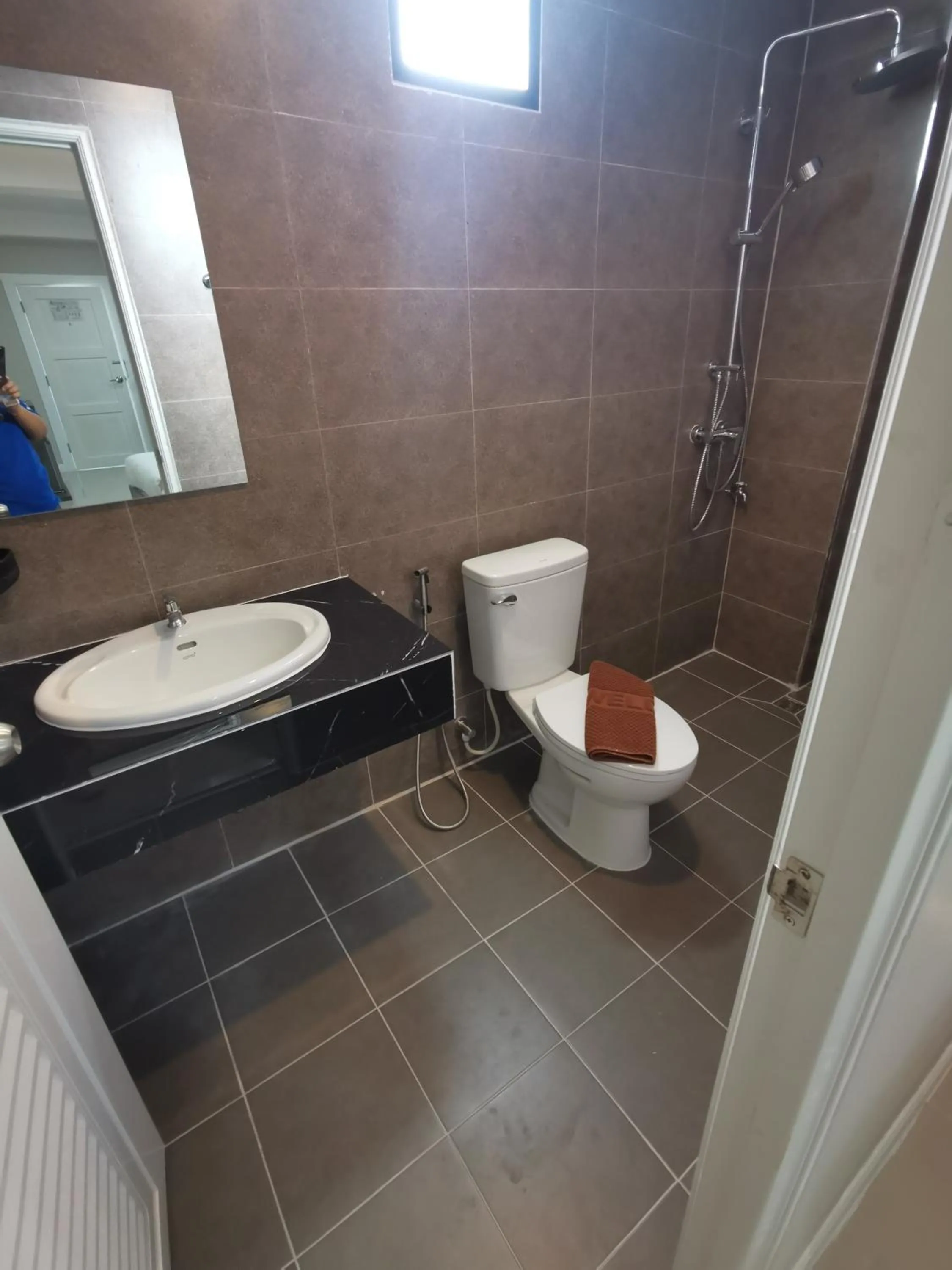 Shower in We Resident Hotel