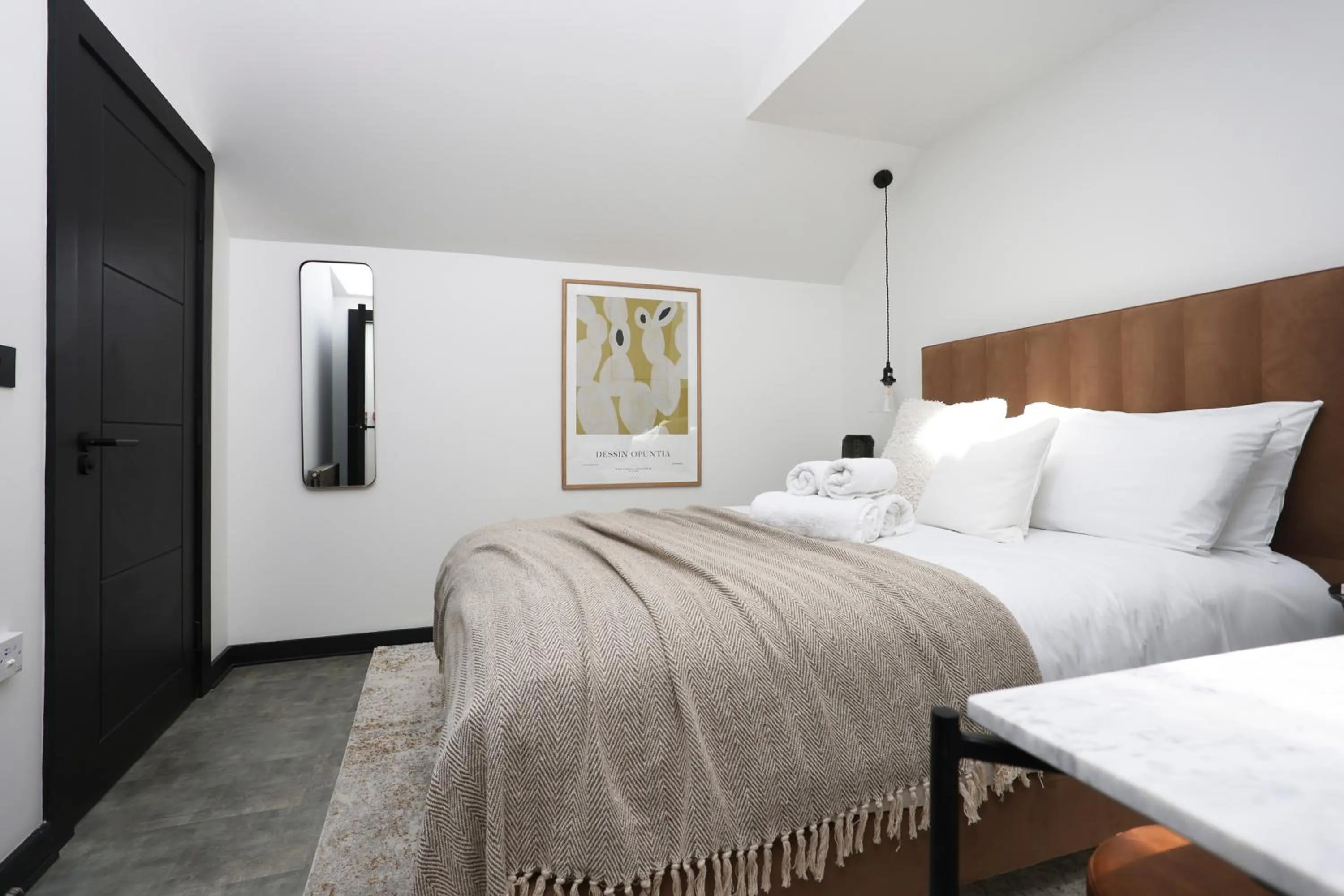 Bed in The Brewers Rooms Contemporary Aparthotel