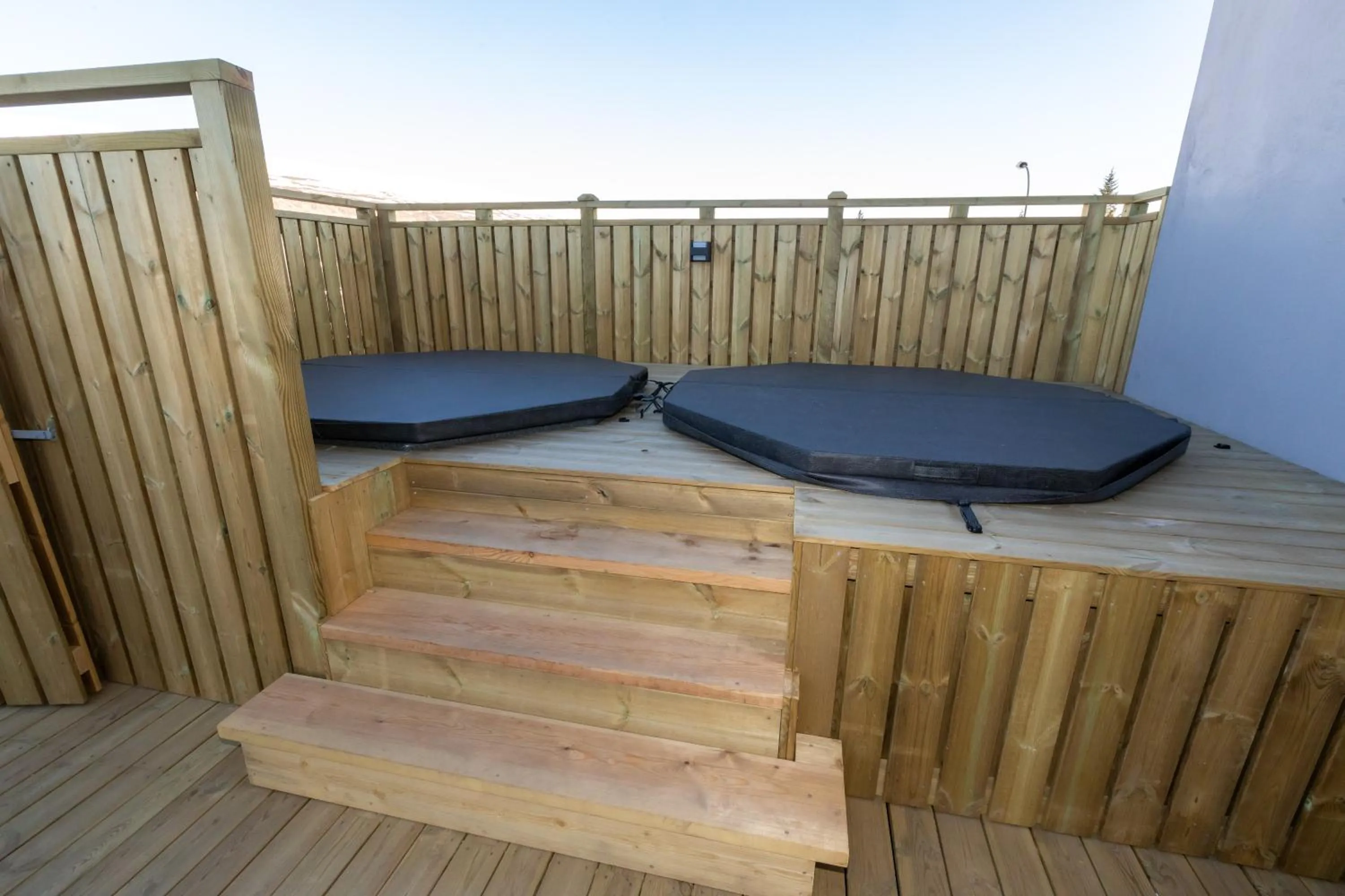 Patio in Akureyri Lux Apartments with hot tub access