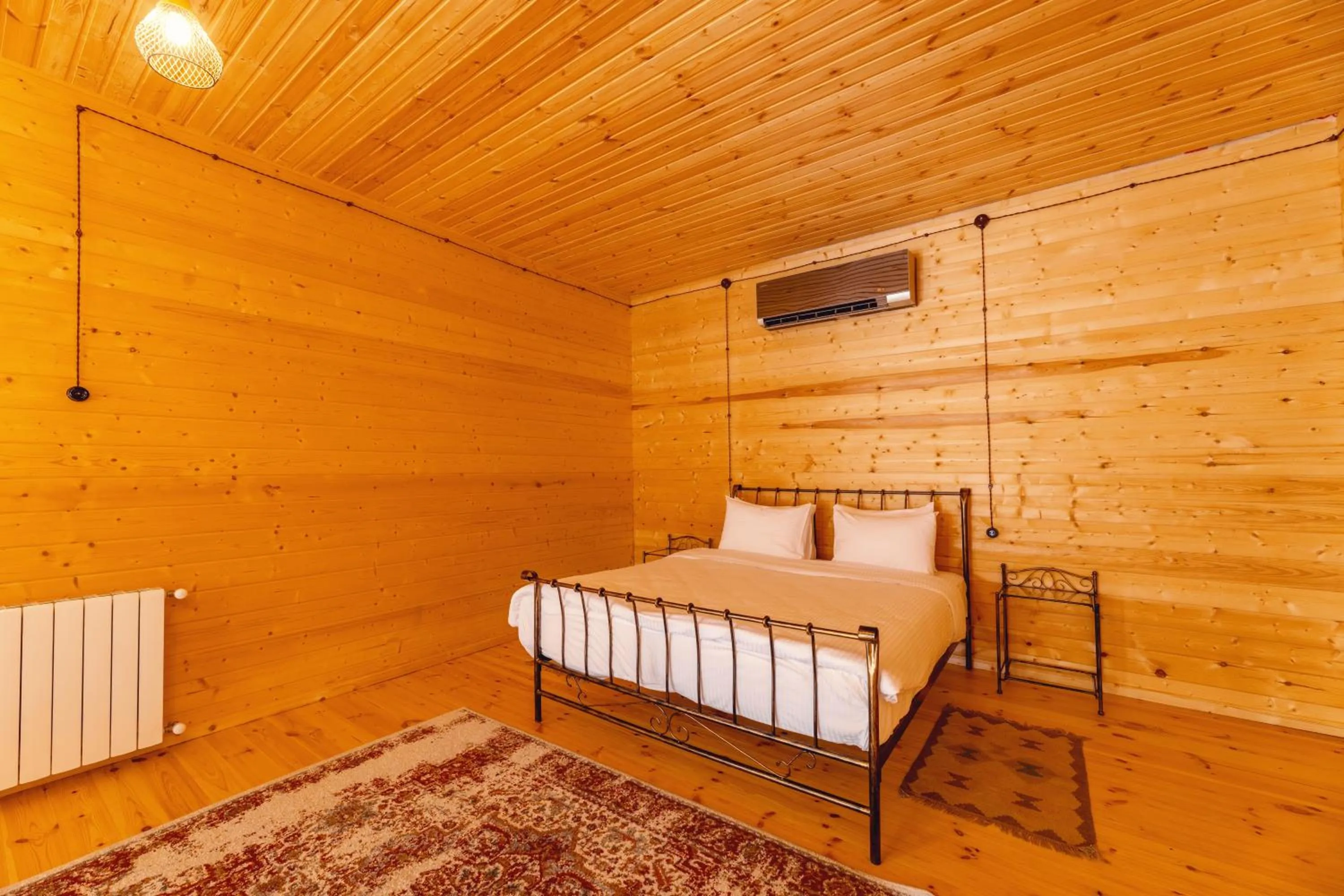 Bed in Hotel Chateau Kvirike