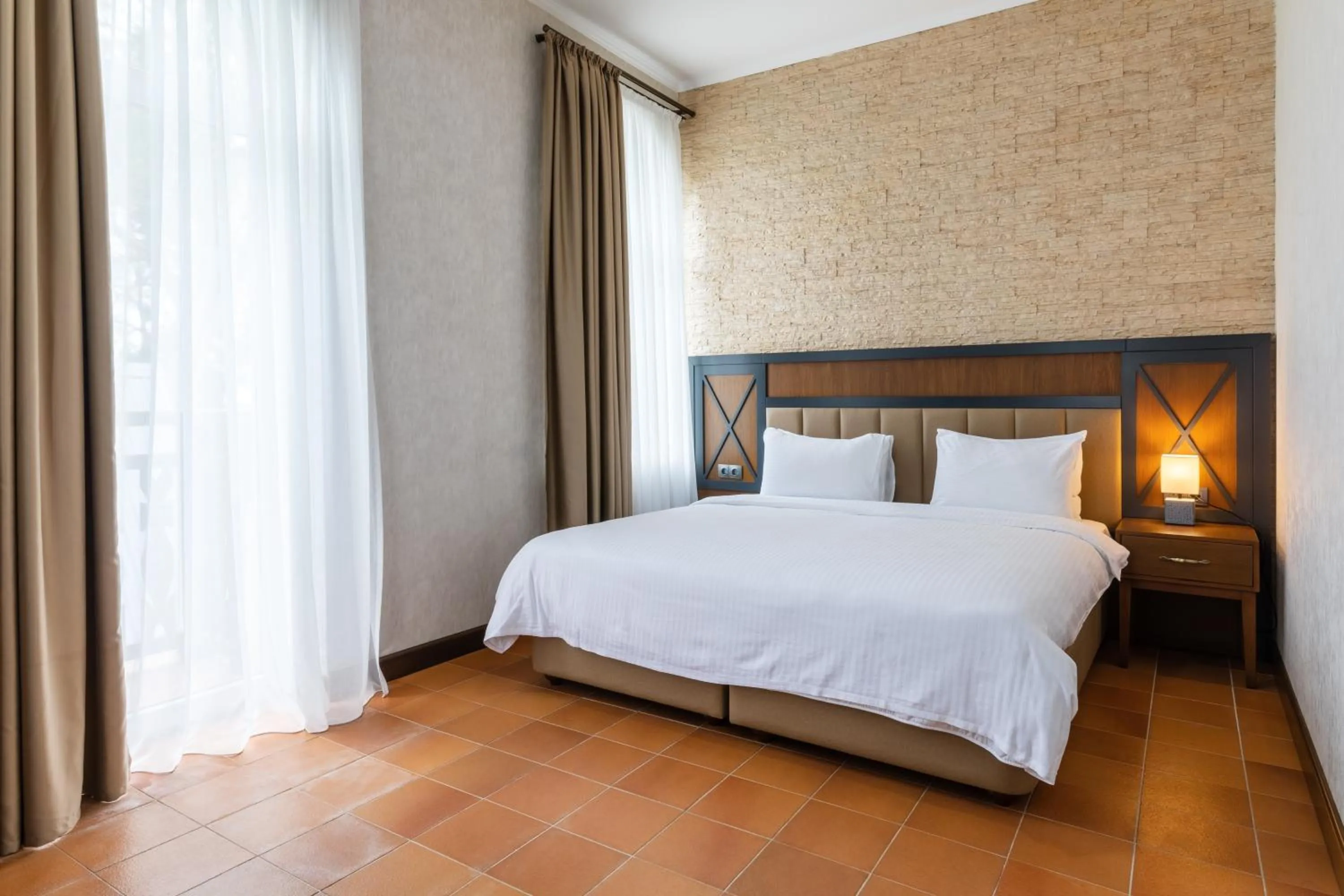 Bed in Hotel Chateau Kvirike