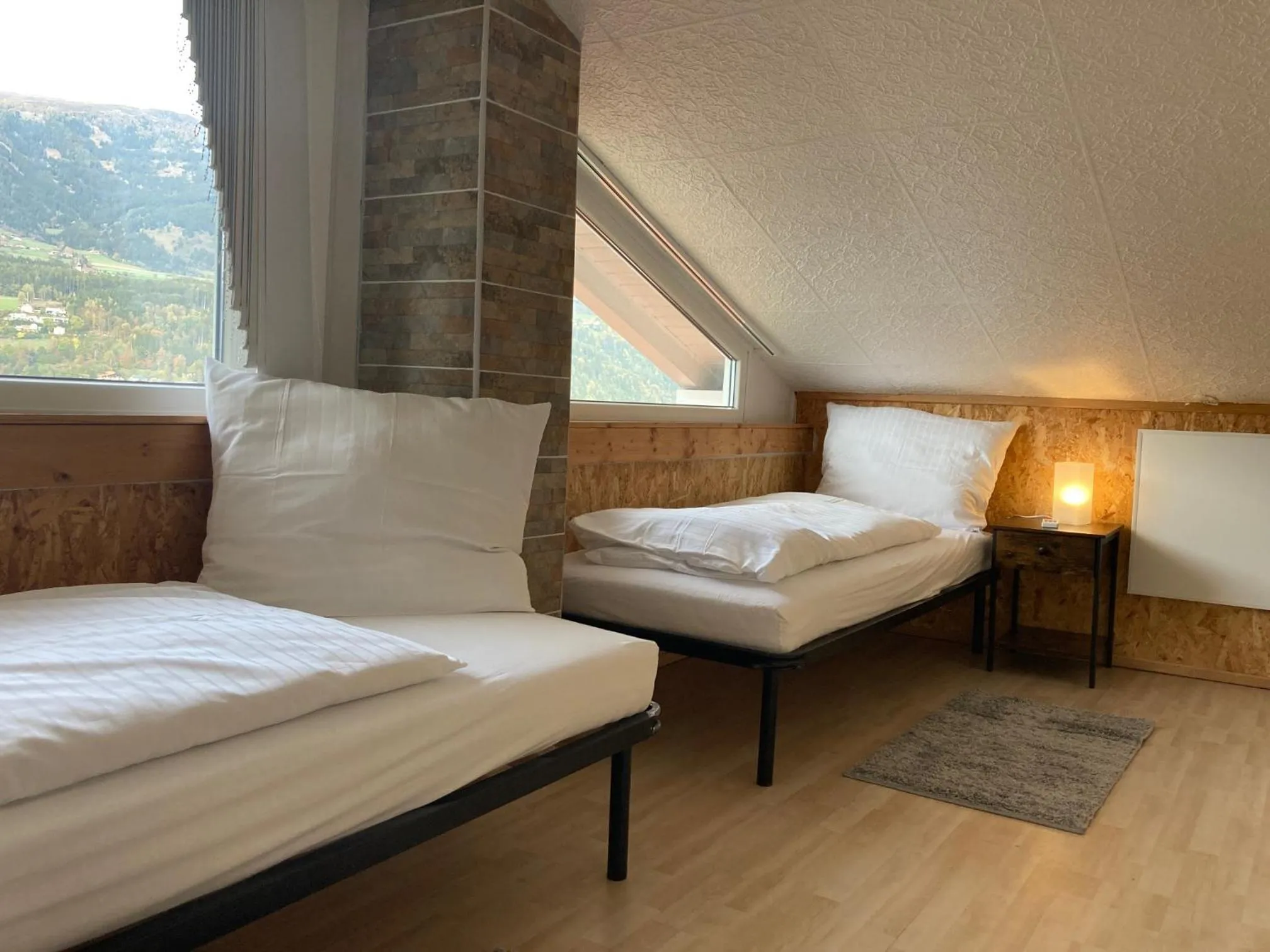 Bed in Kantor Village am Millstätter See - Boutique-Chalets und Lodges