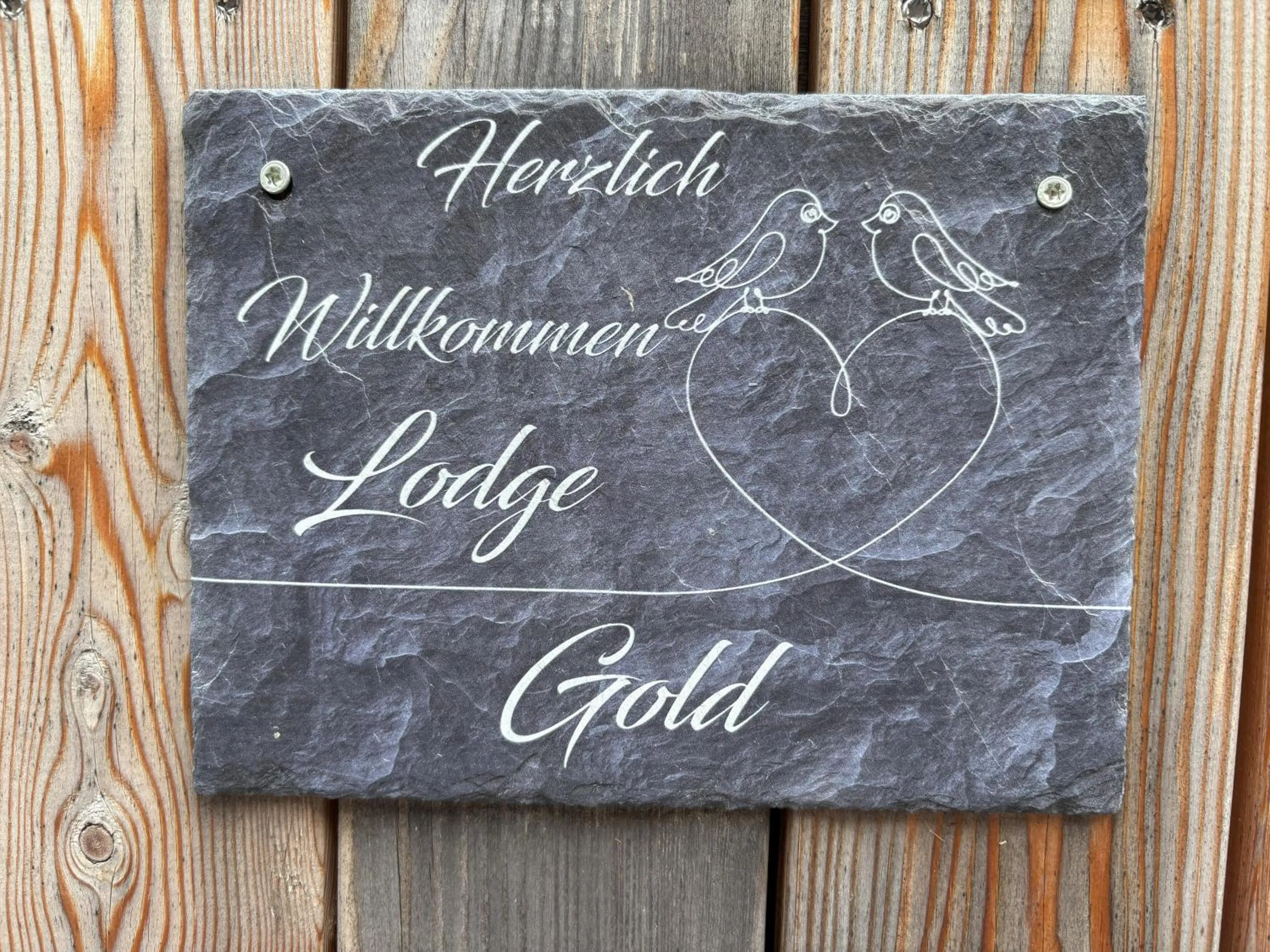 Property logo or sign in Kantor Village am Millstätter See - Boutique-Chalets und Lodges