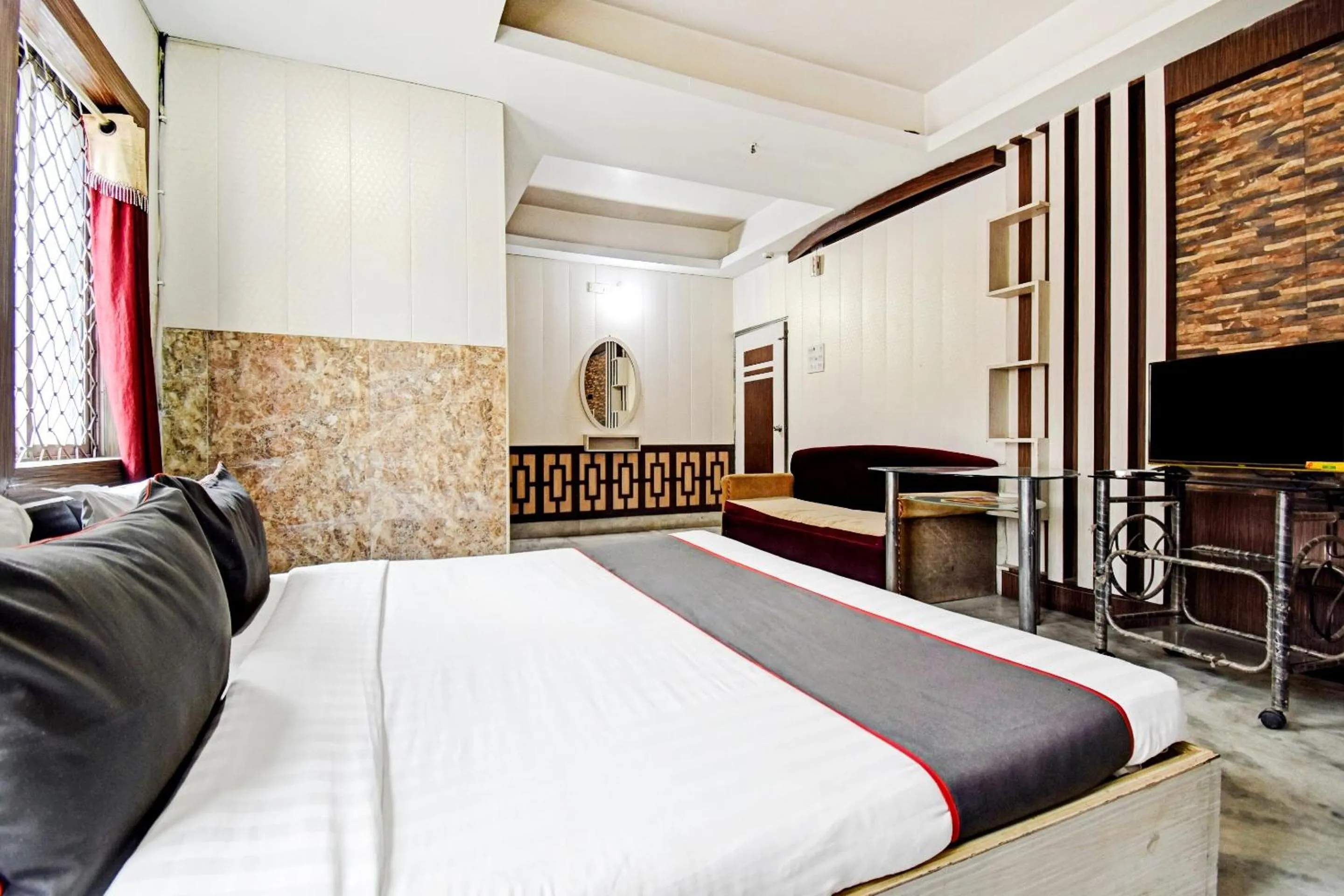 Bedroom, Bed in Hotel O Shree Krishna International