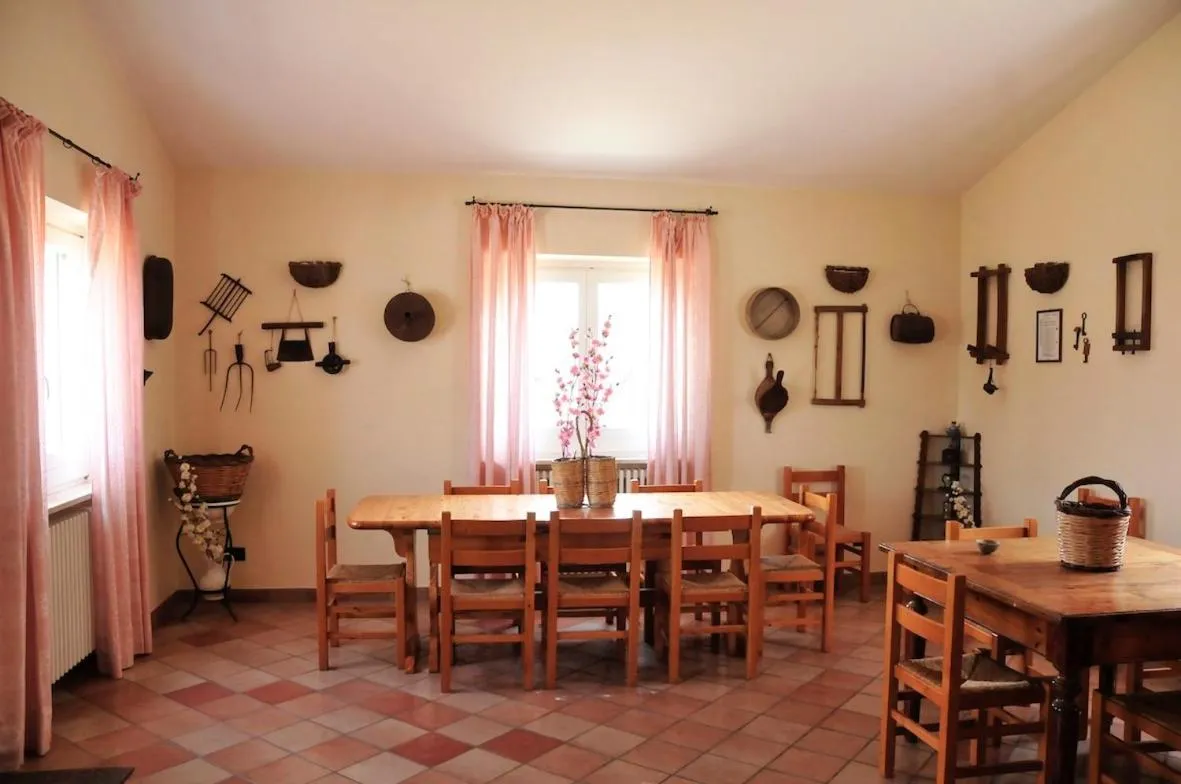 Communal lounge/ TV room in La Masseria di Villa Giulia
