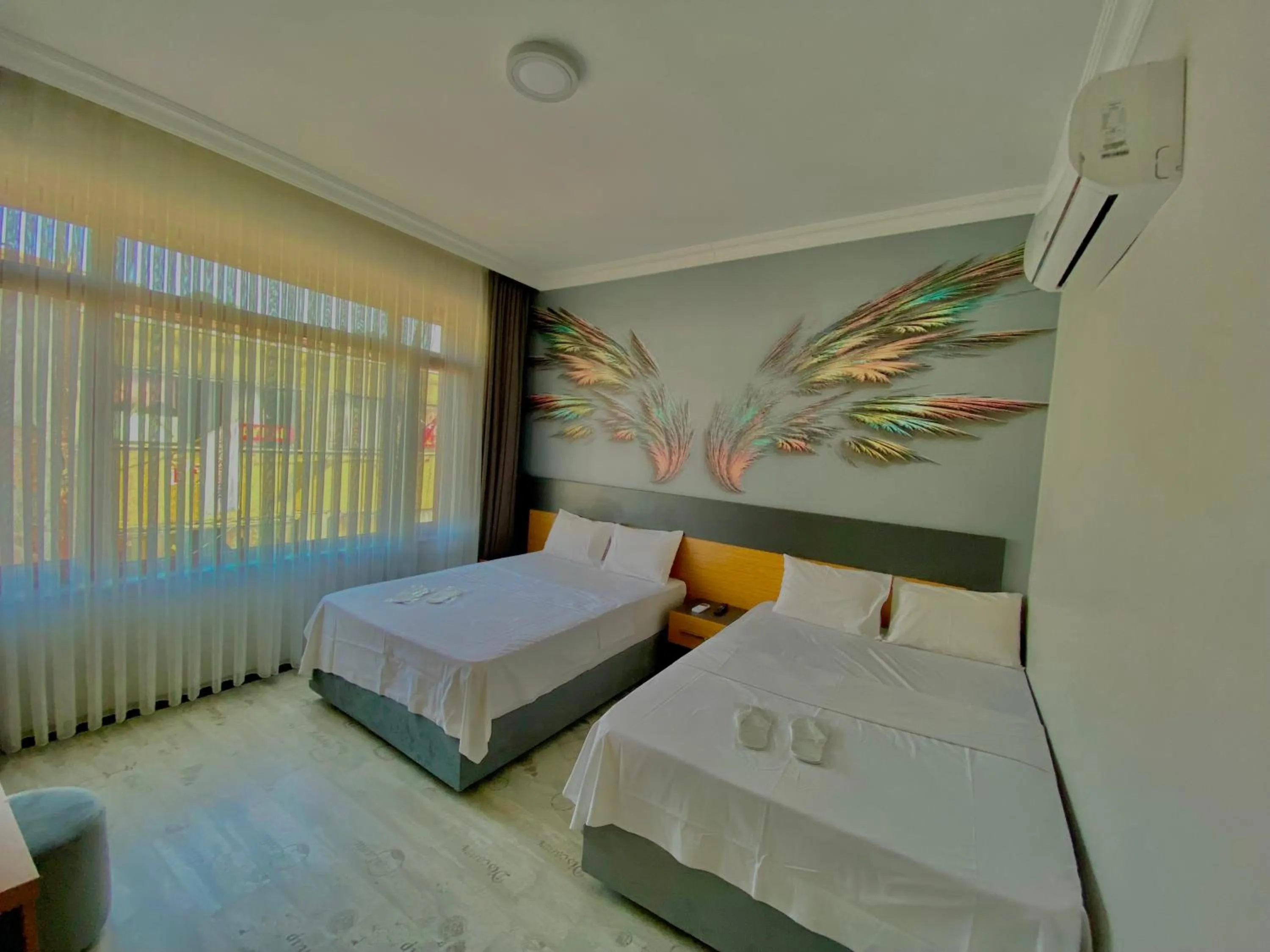 Bed in Victorious Hotel