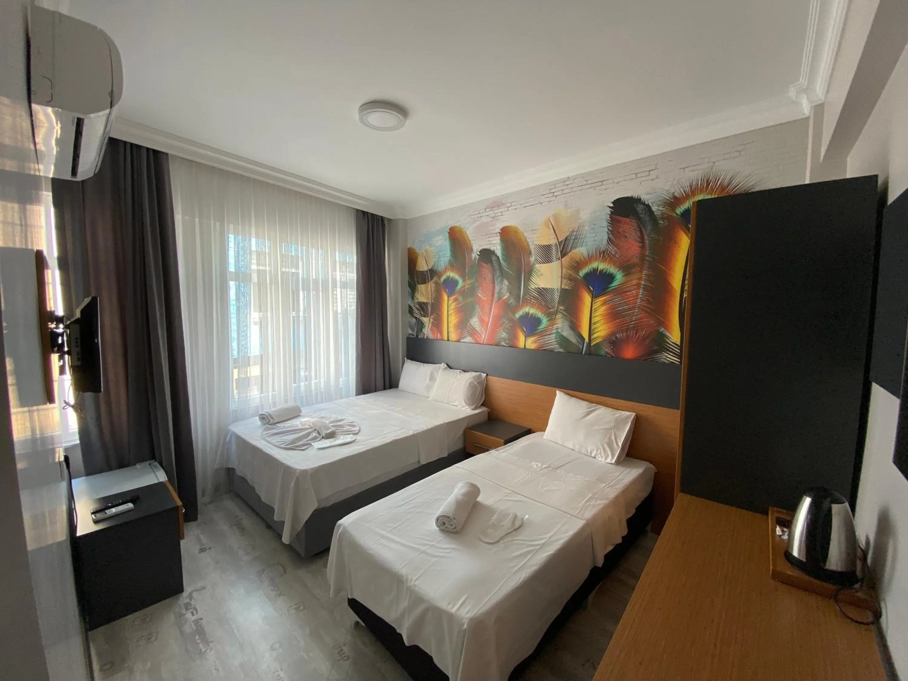 Bed in Victorious Hotel