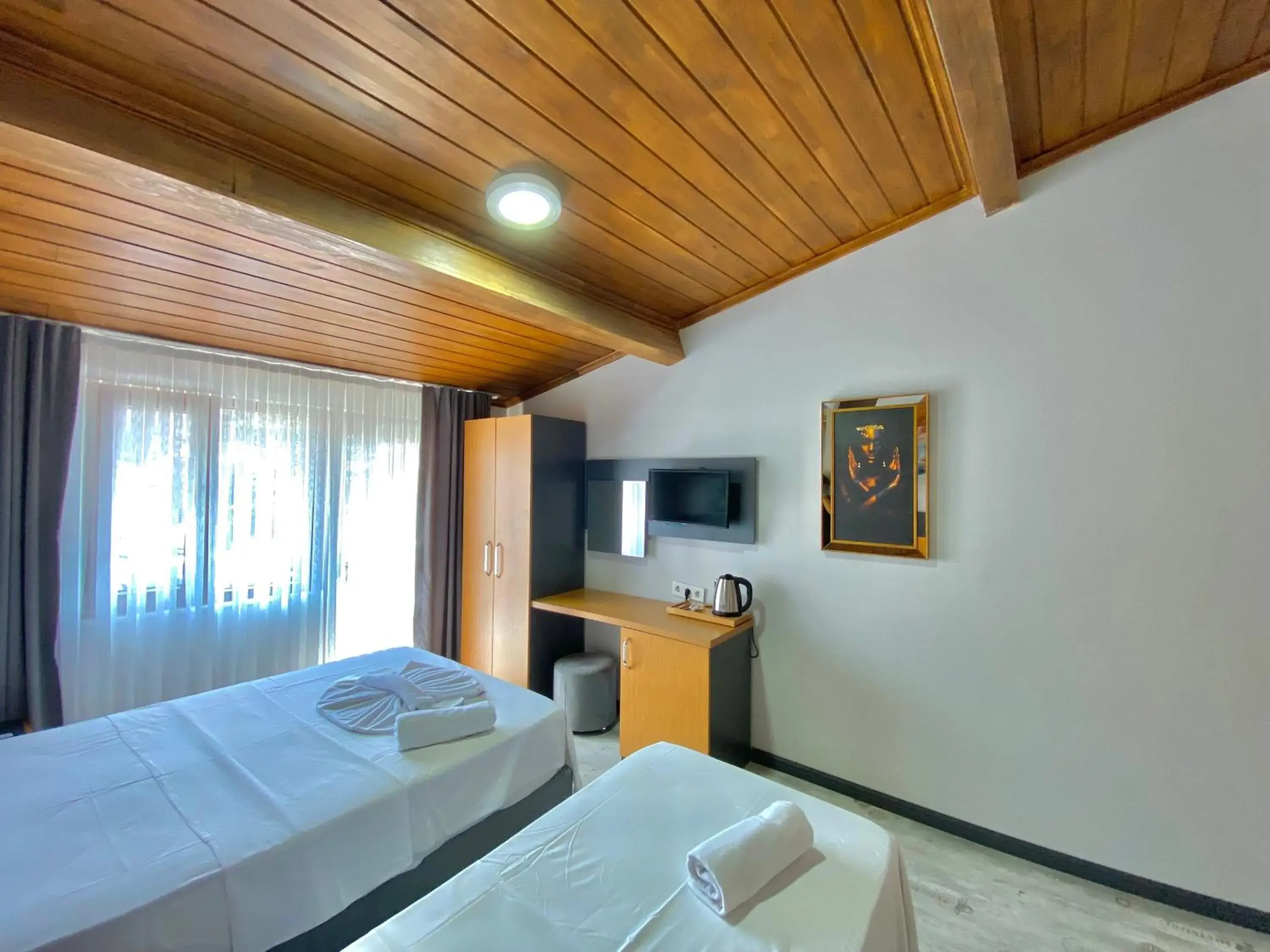 Triple Room with Balcony in Victorious Hotel Triple Room with Balcony in Victorious Hotel