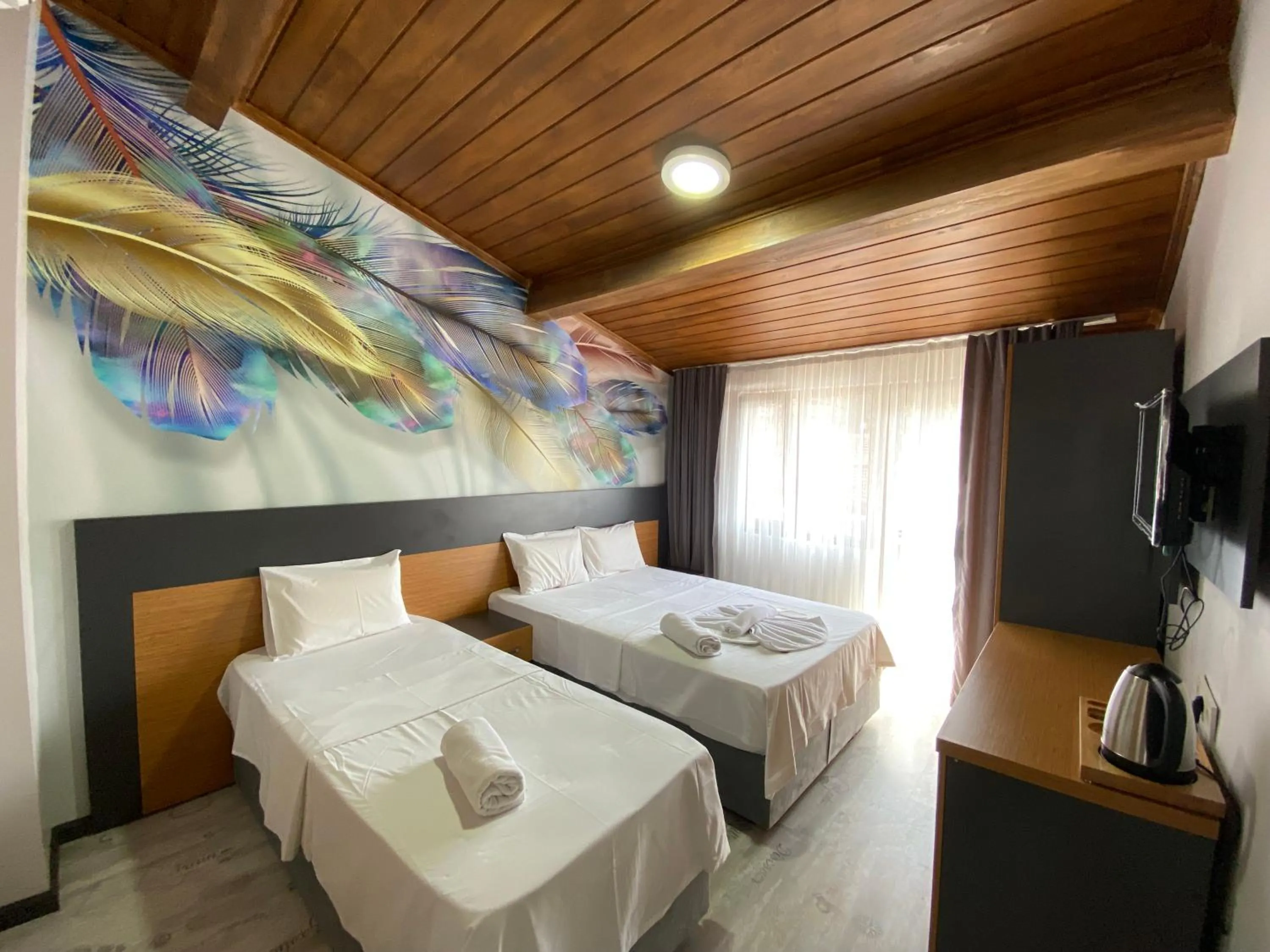 Bed in Victorious Hotel