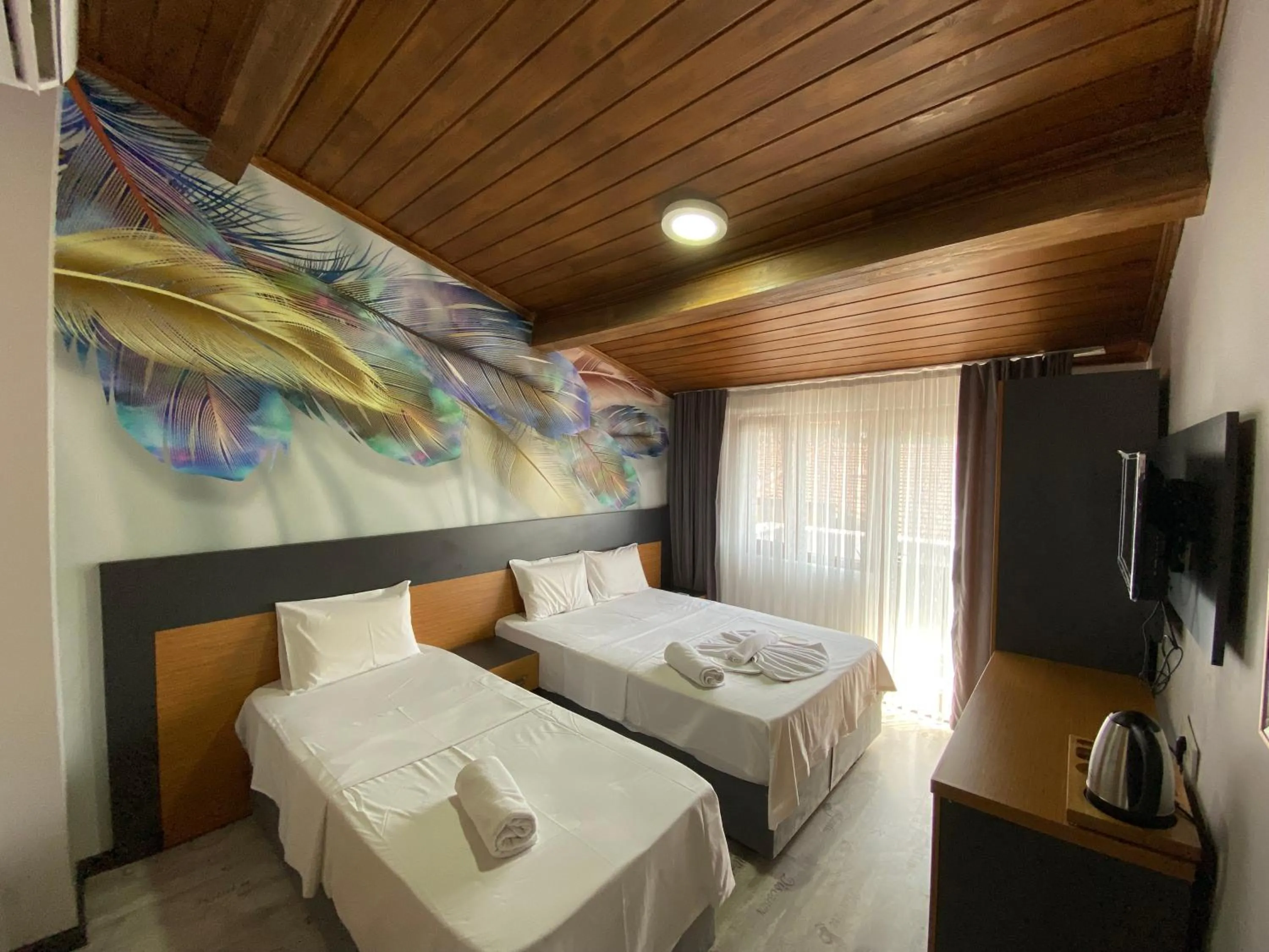 Bed in Victorious Hotel