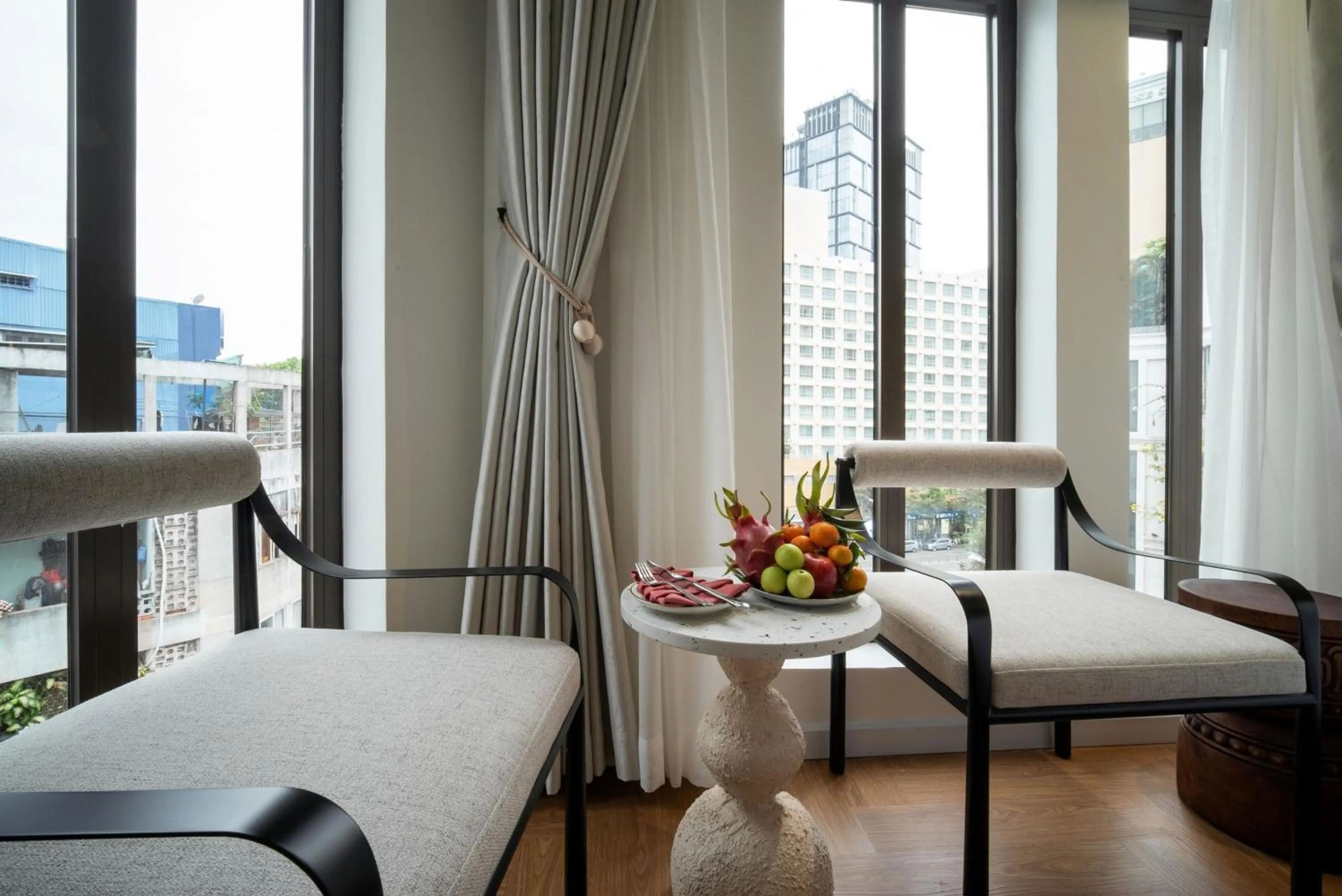 Living room, Bed in Me Saigon Boutique Hotel