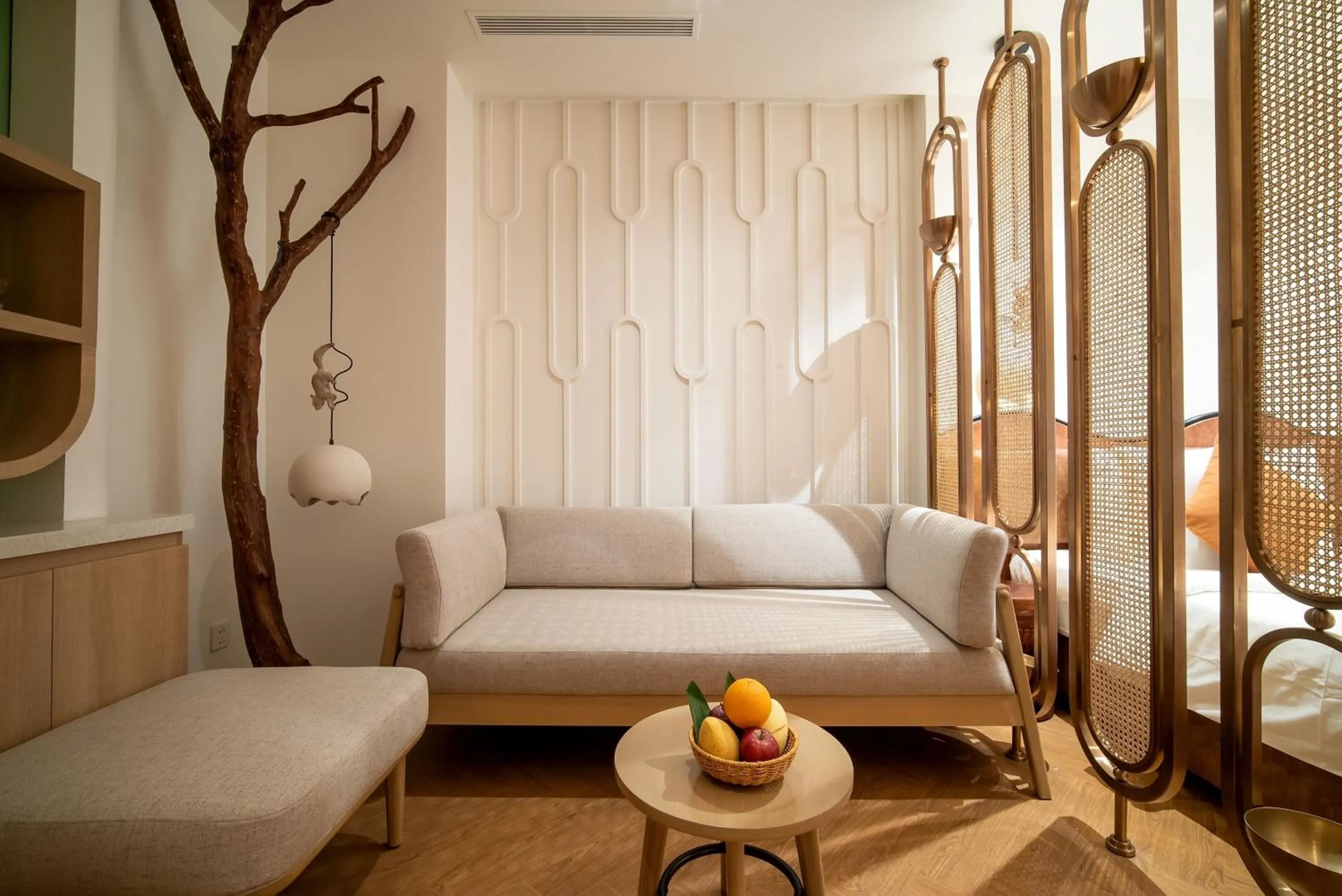 Living room, Bed in Me Saigon Boutique Hotel