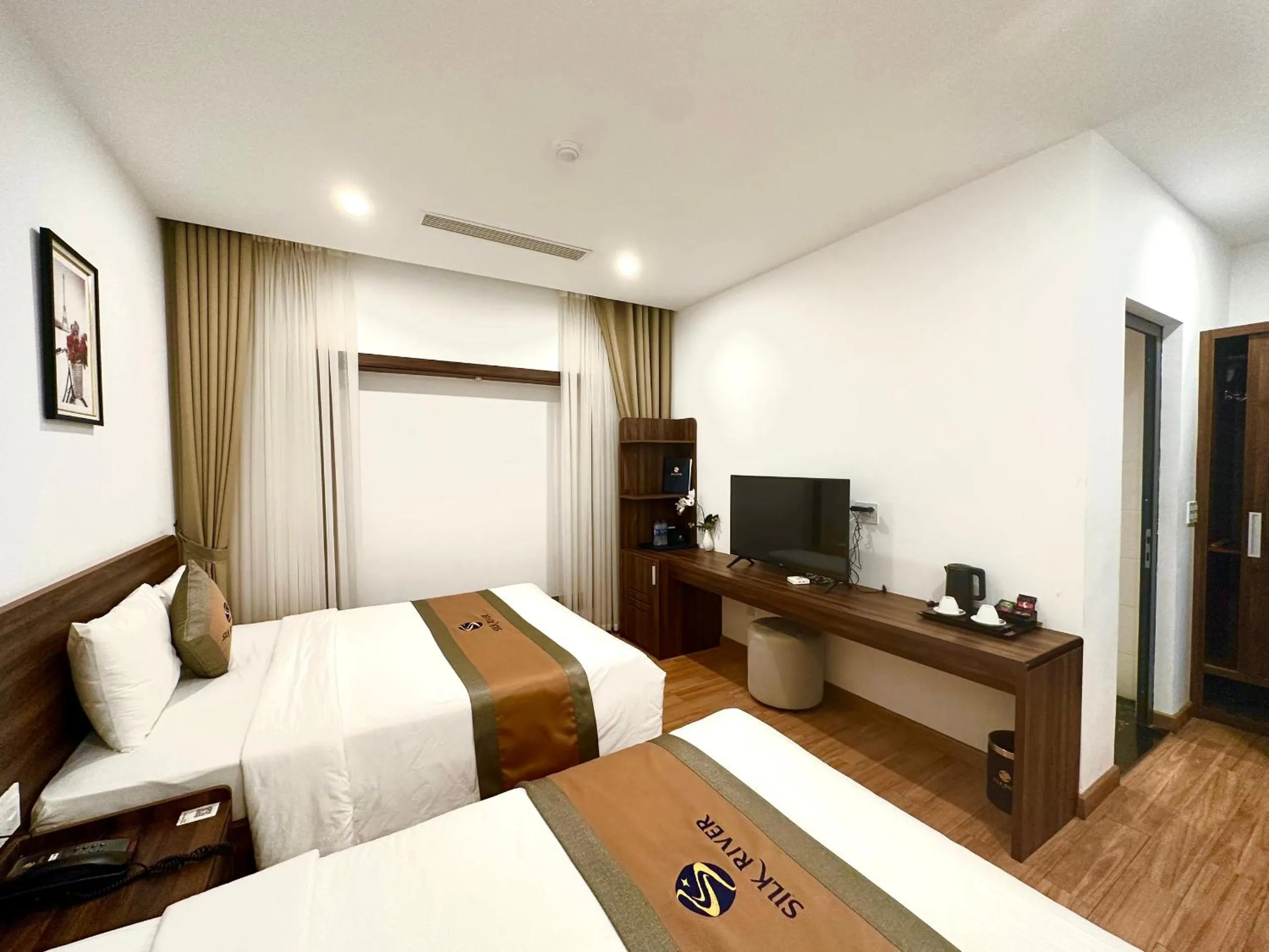 Bed in Silk River Hotel Ha Giang