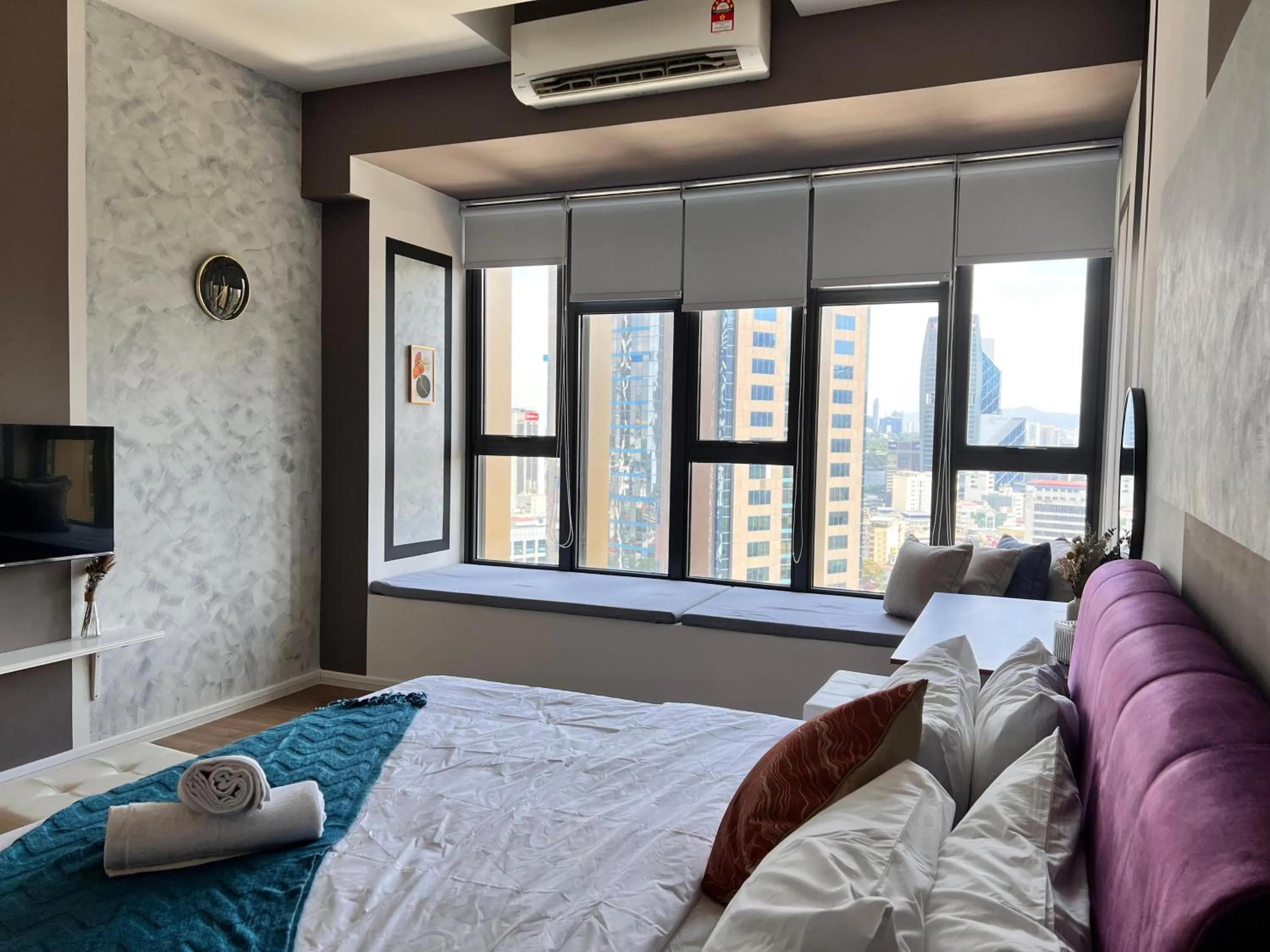 Bed in Ceylonz Suites by Living Signature