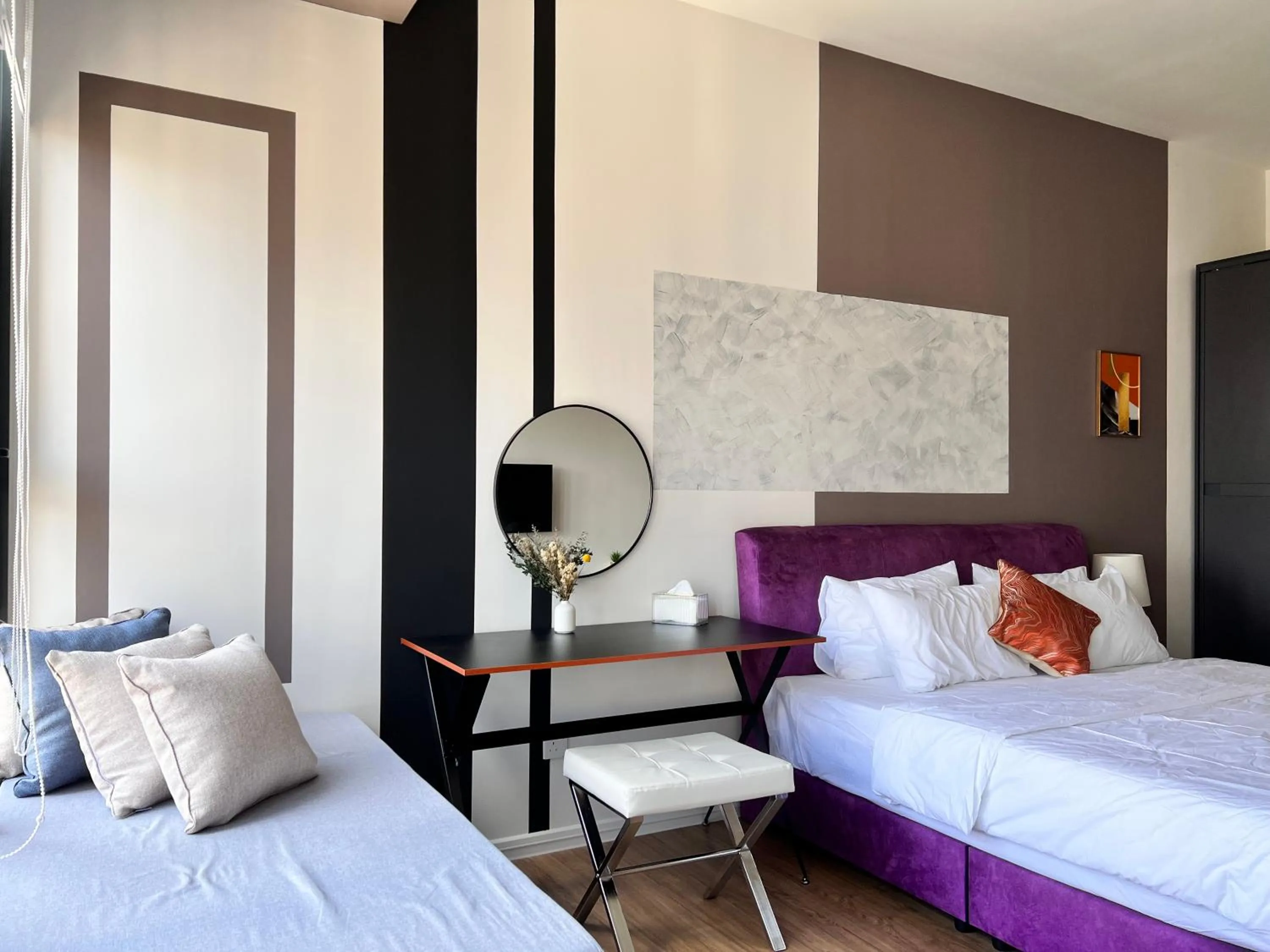 Bed in Ceylonz Suites by Living Signature