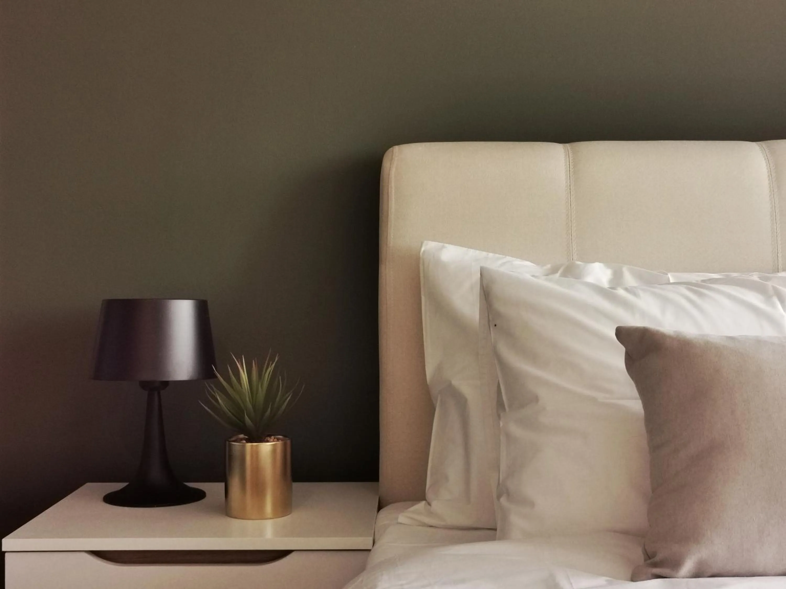 Bed in Ceylonz Suites by Living Signature