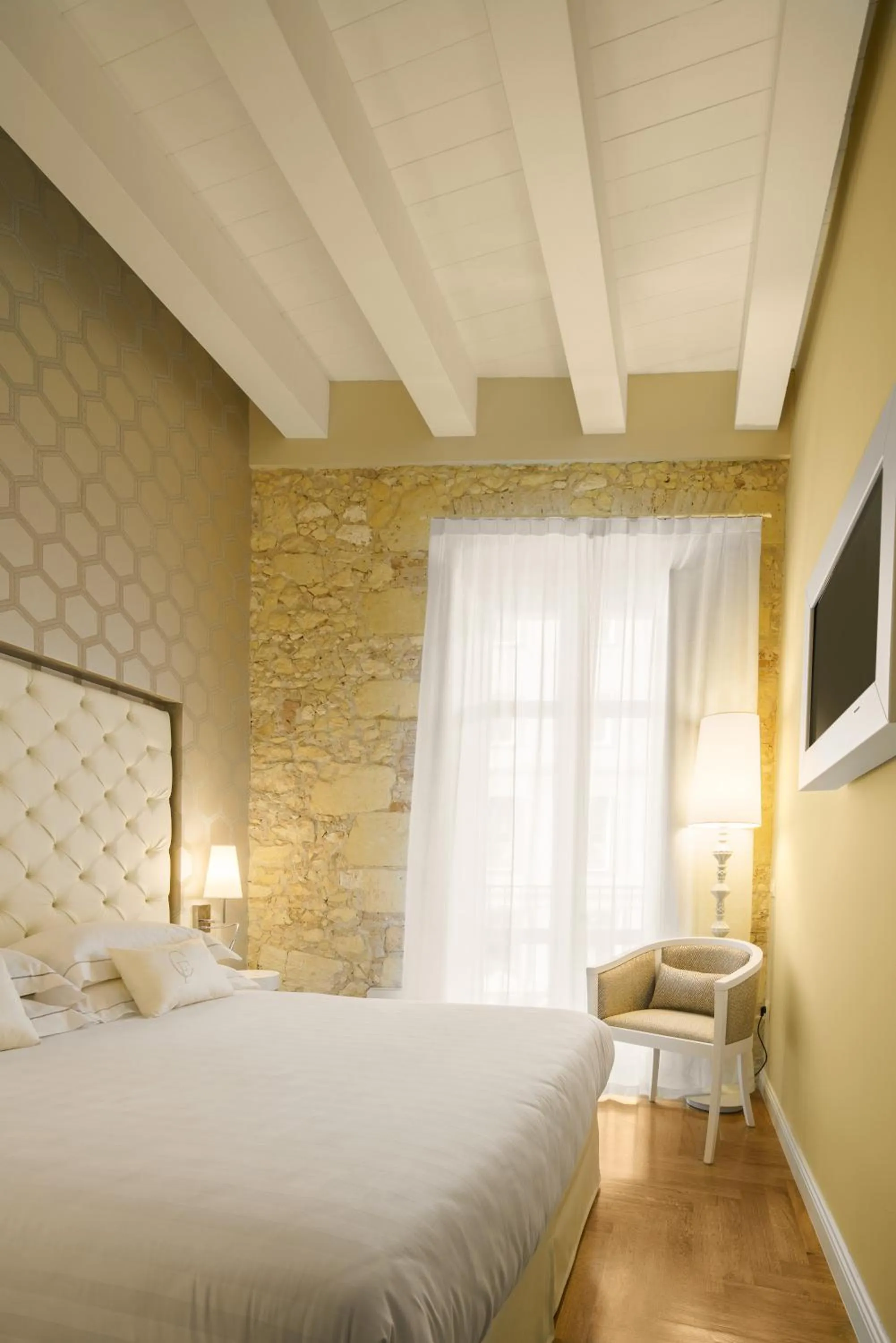 Bed in Boutique Hotel Carlo Felice