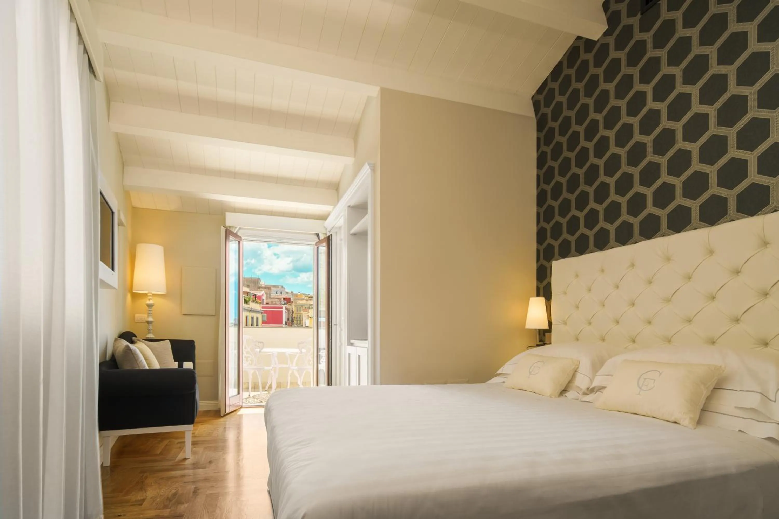 Bed in Boutique Hotel Carlo Felice