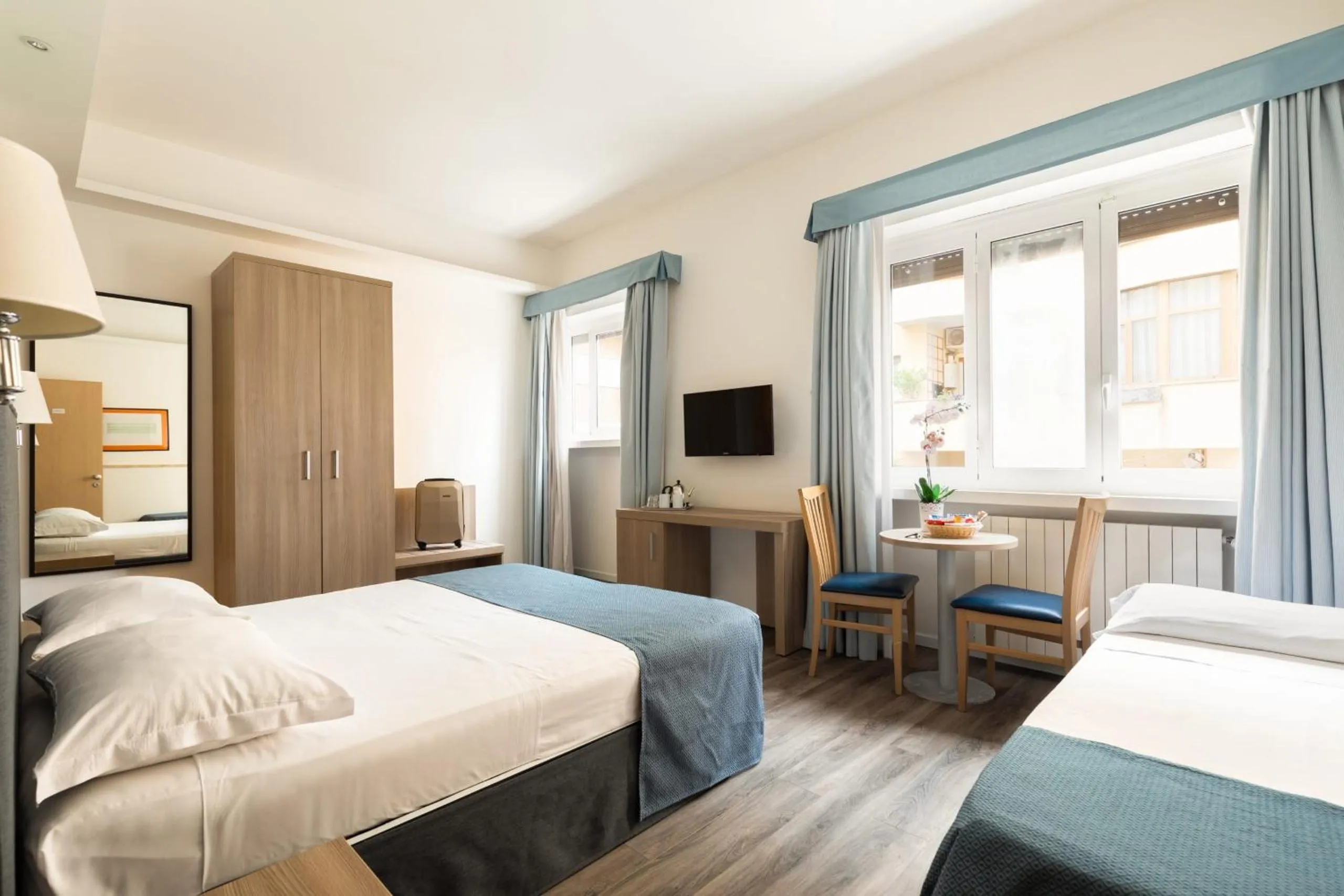 Photo of the whole room, Bed in Fleming Suites by Hili