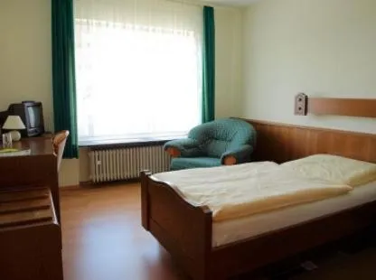 Bed in Hotel-Pension Ursula