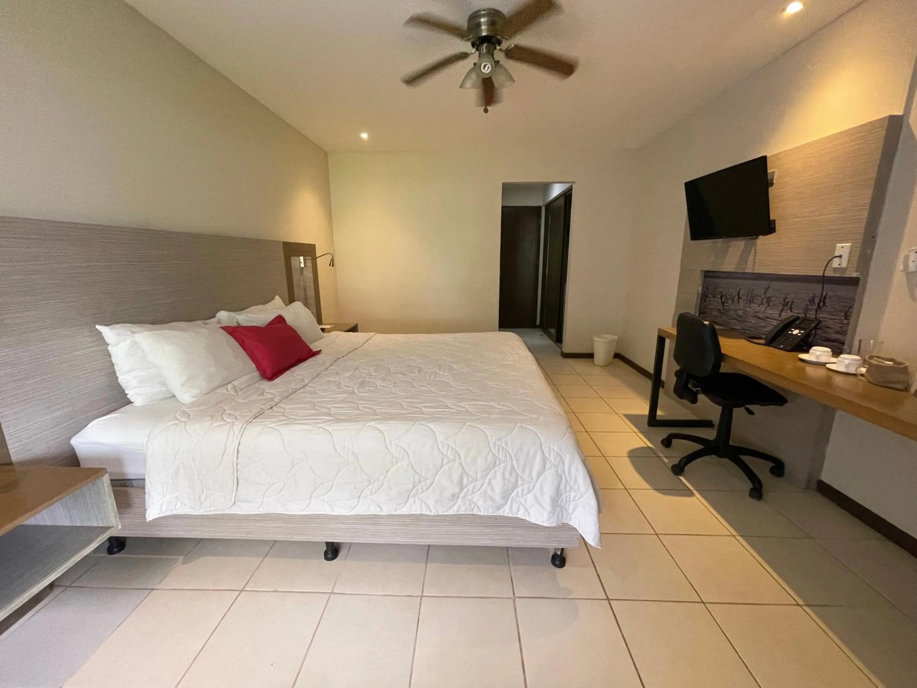 Photo of the whole room, Bed in Puerto Azul Hotel