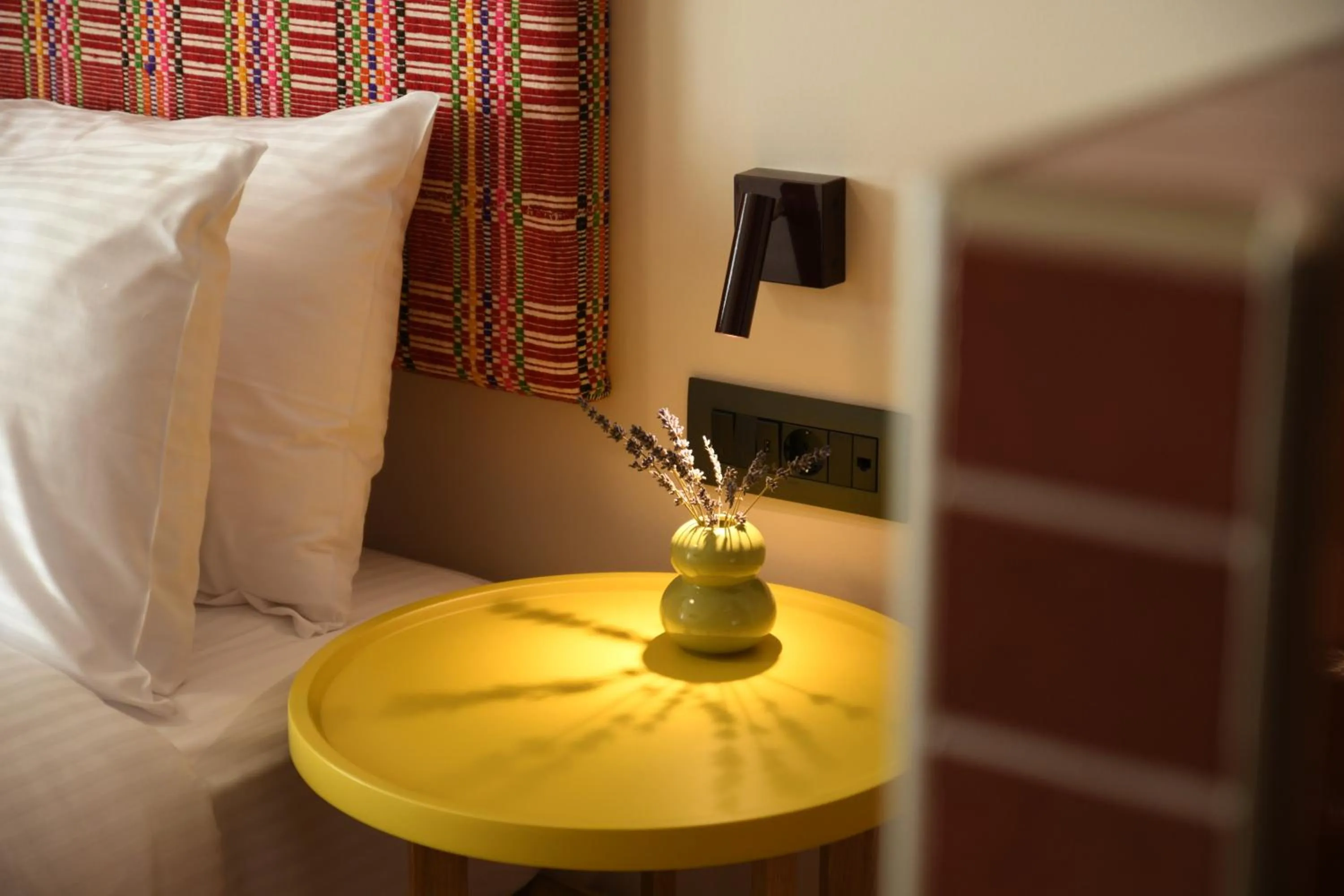 Decorative detail, Bed in Pavo Art Hotel