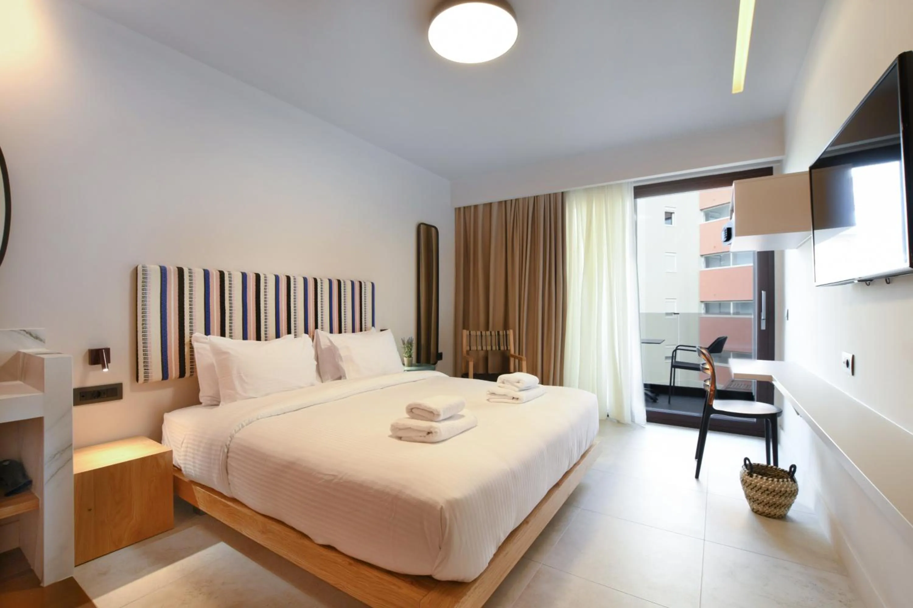 Bed in Pavo Art Hotel
