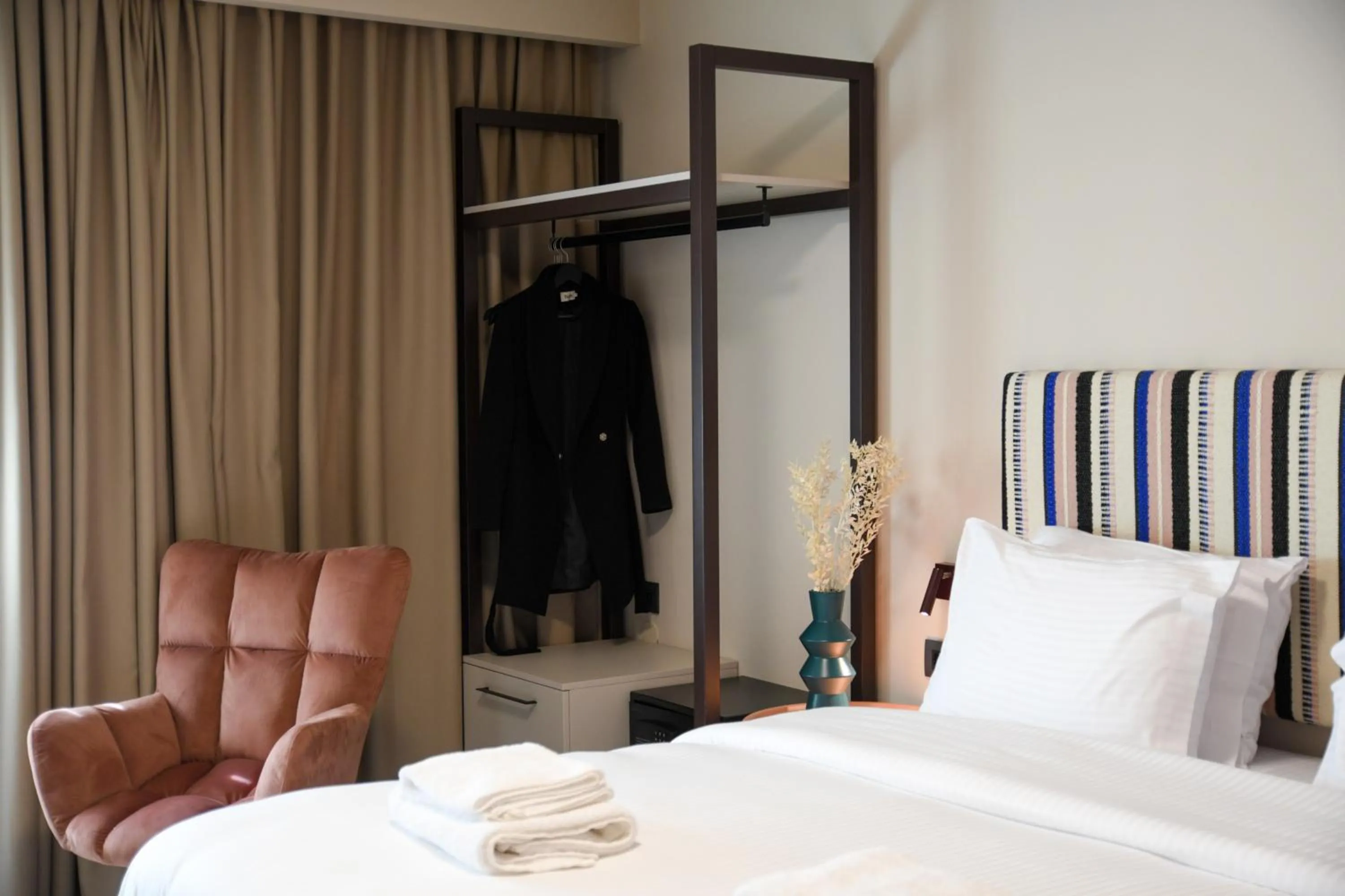 Bed in Pavo Art Hotel