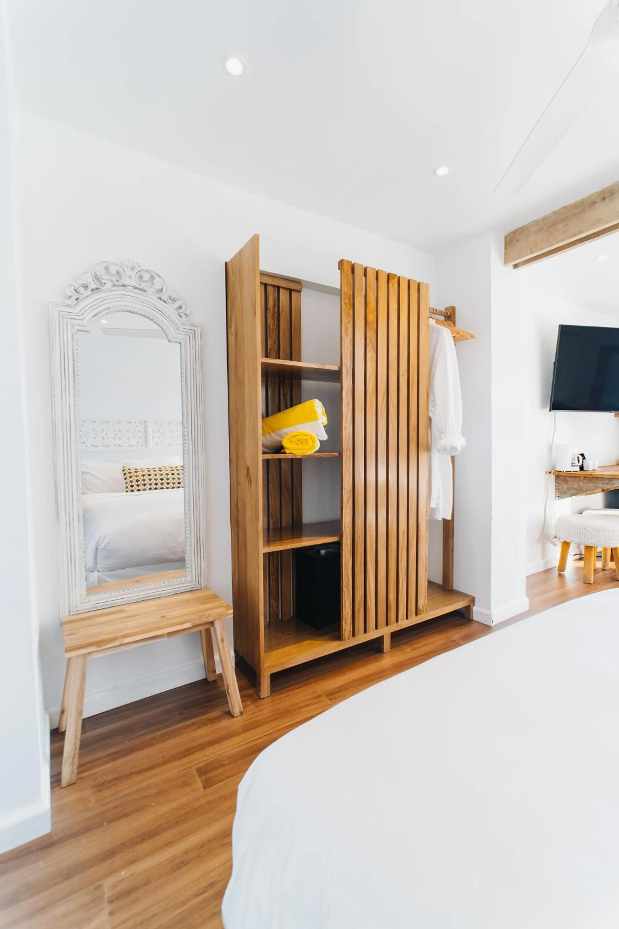 wardrobe, Bed in The Beach House Boutique Hotel