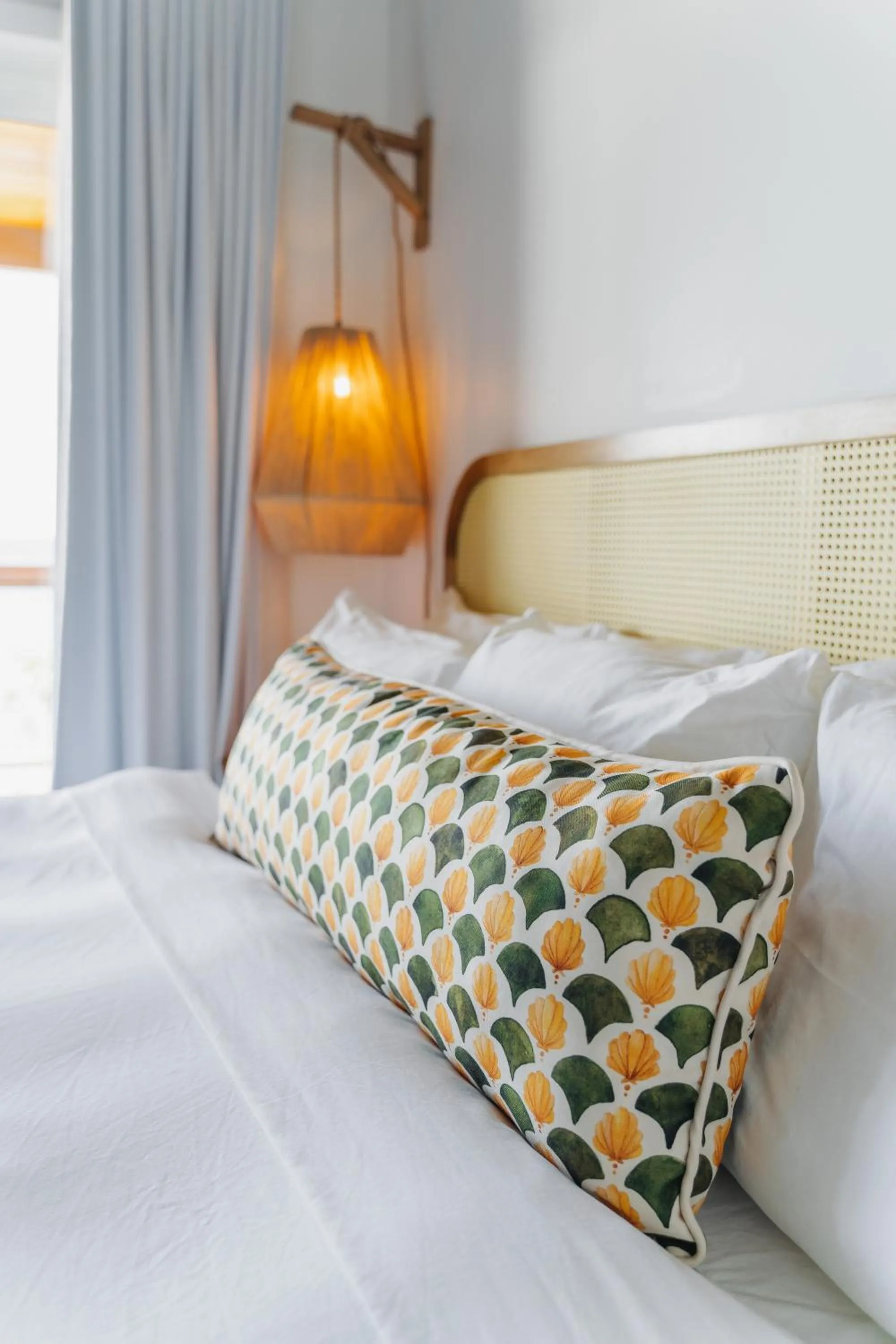 Bed in The Beach House Boutique Hotel