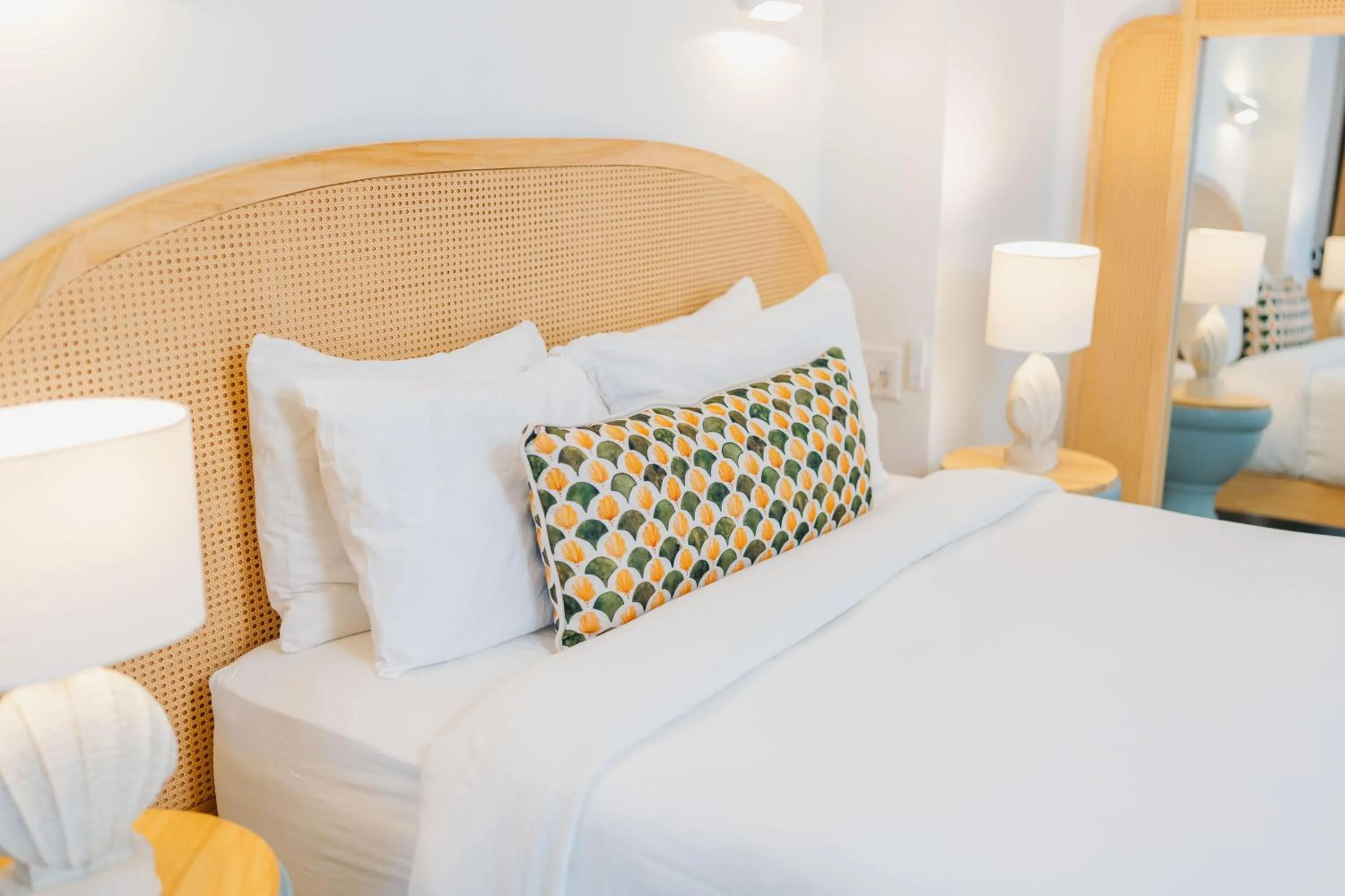 Bed in The Beach House Boutique Hotel