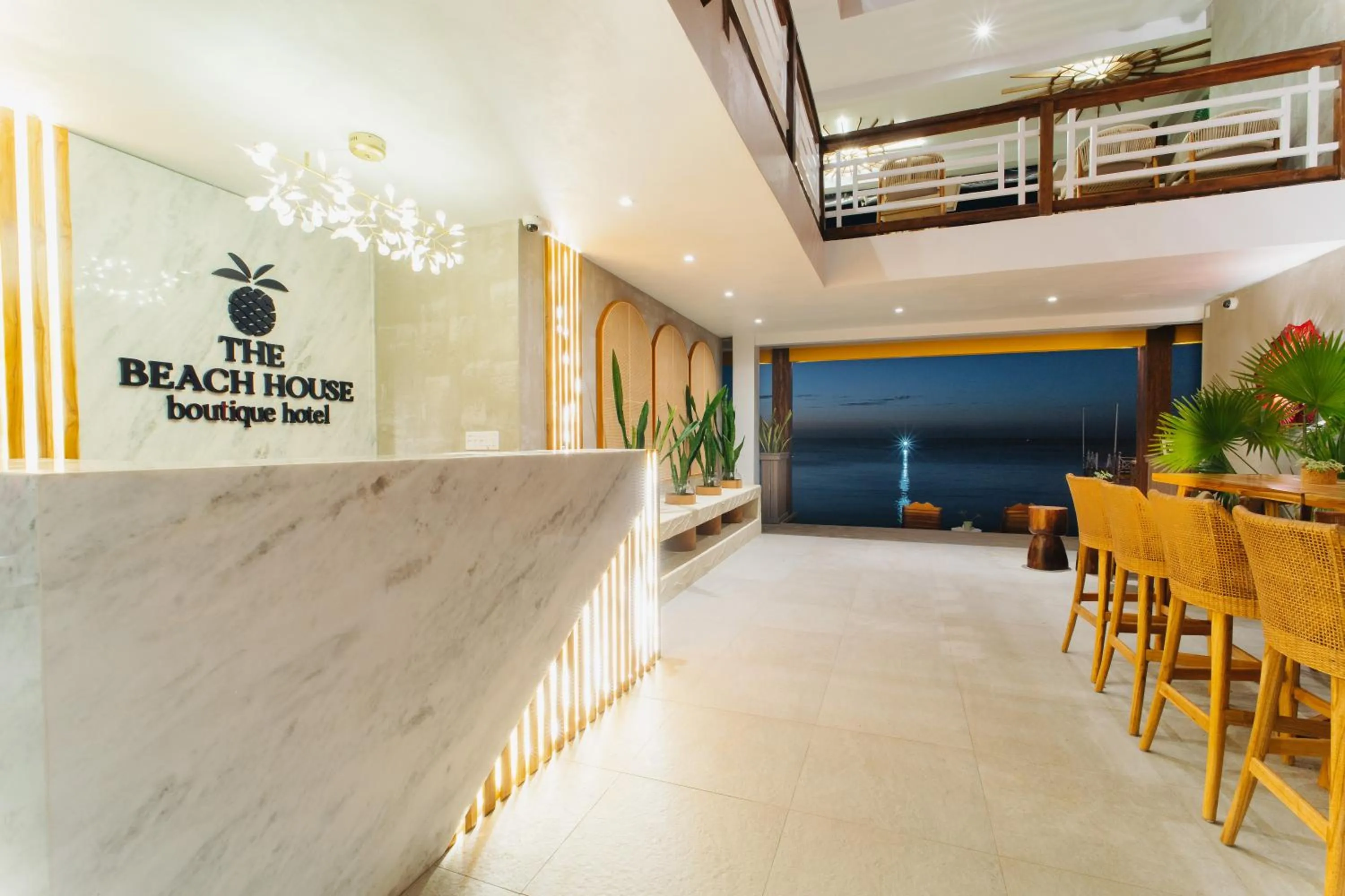 Property logo or sign in The Beach House Boutique Hotel