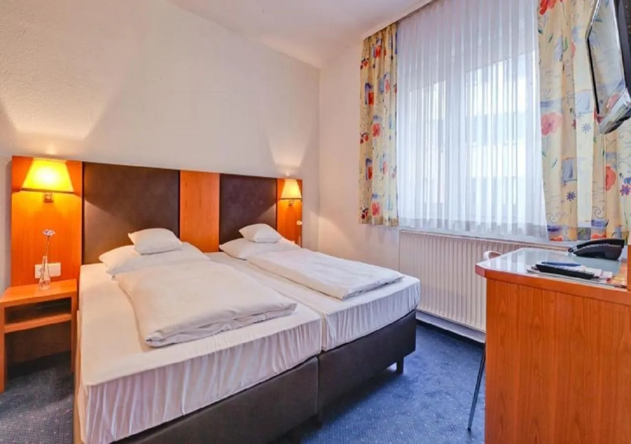 Photo of the whole room, Bed in Hotel am Friedensplatz