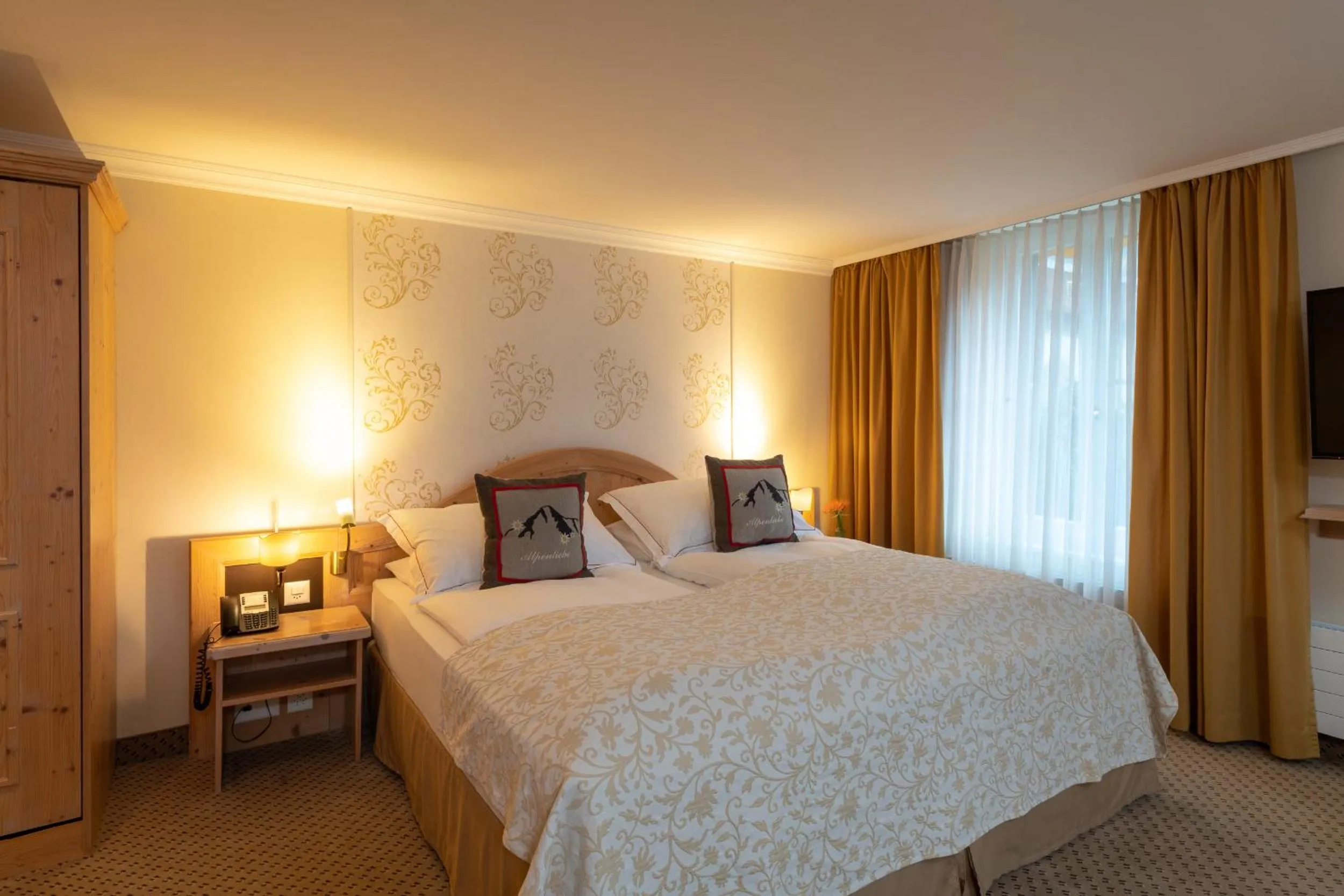 Bedroom, Bed in Romantik Hotel Schweizerhof