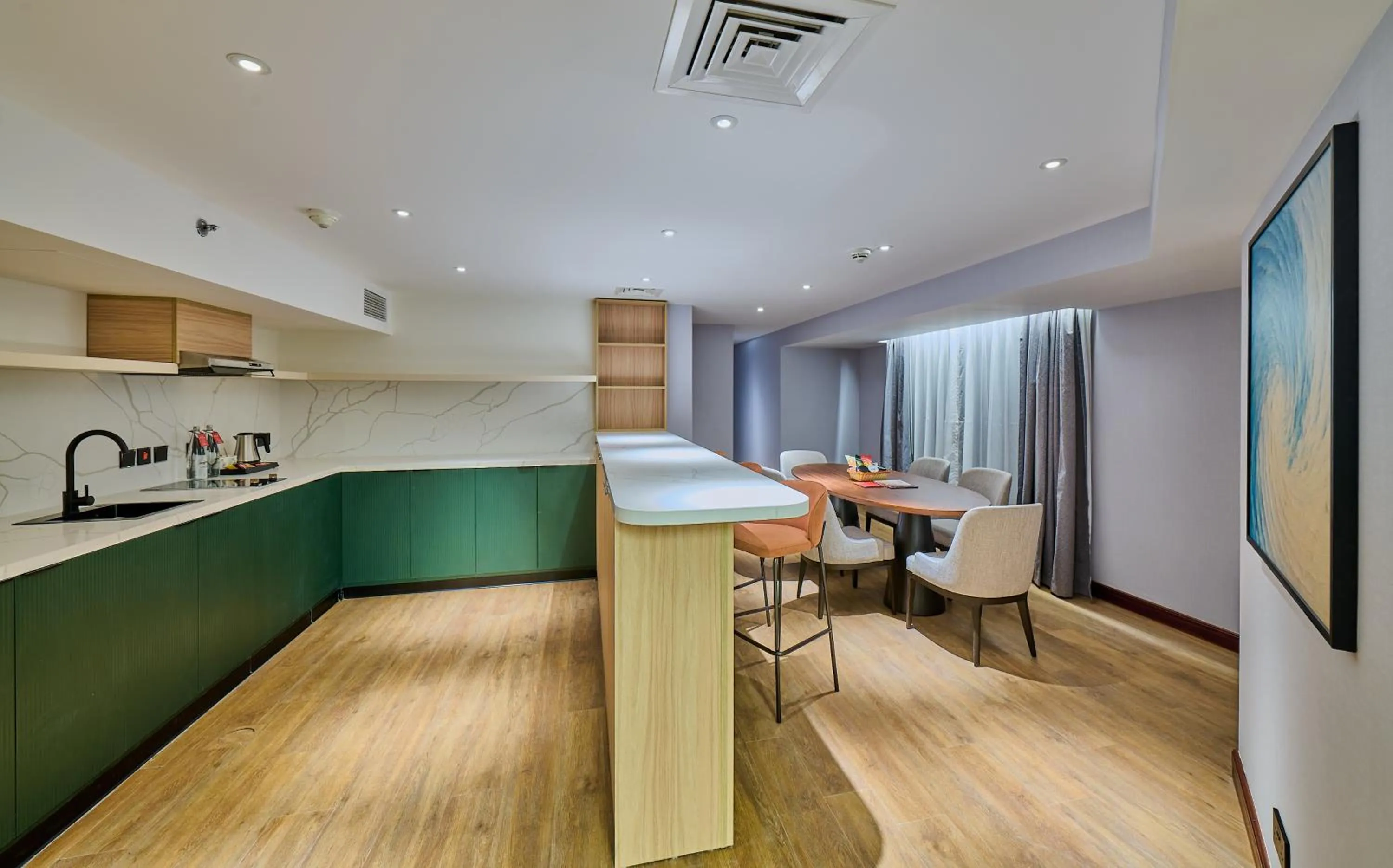 Kitchen or kitchenette in Ramada Hotel, Suites and Apartments by Wyndham Dubai JBR