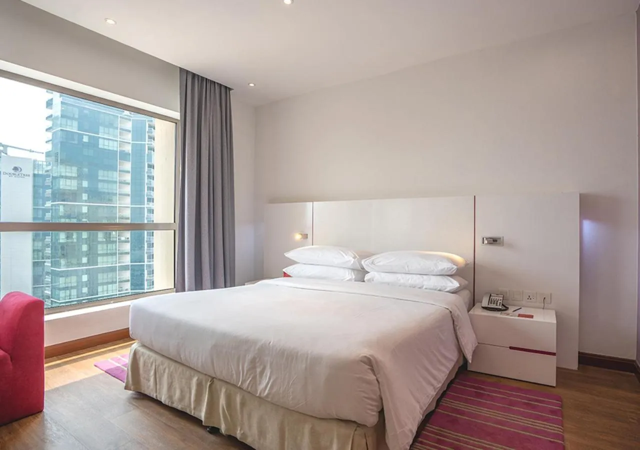 Bed in Ramada Hotel, Suites and Apartments by Wyndham Dubai JBR