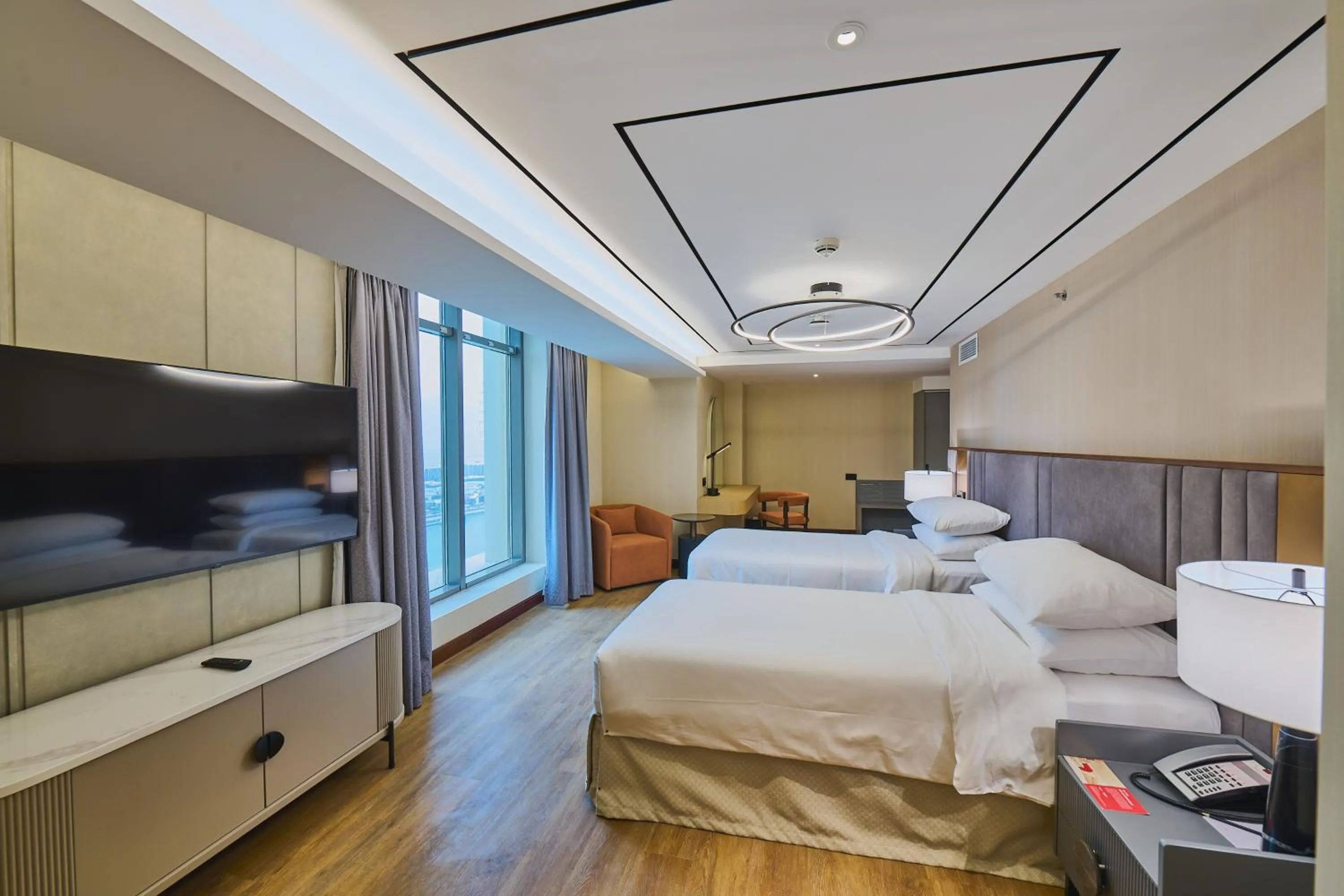 Bed in Ramada Hotel, Suites and Apartments by Wyndham Dubai JBR