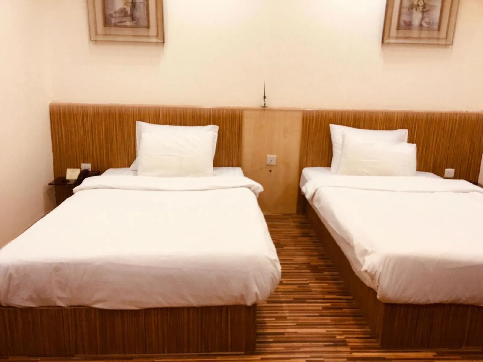 Bed in Palm Hotel