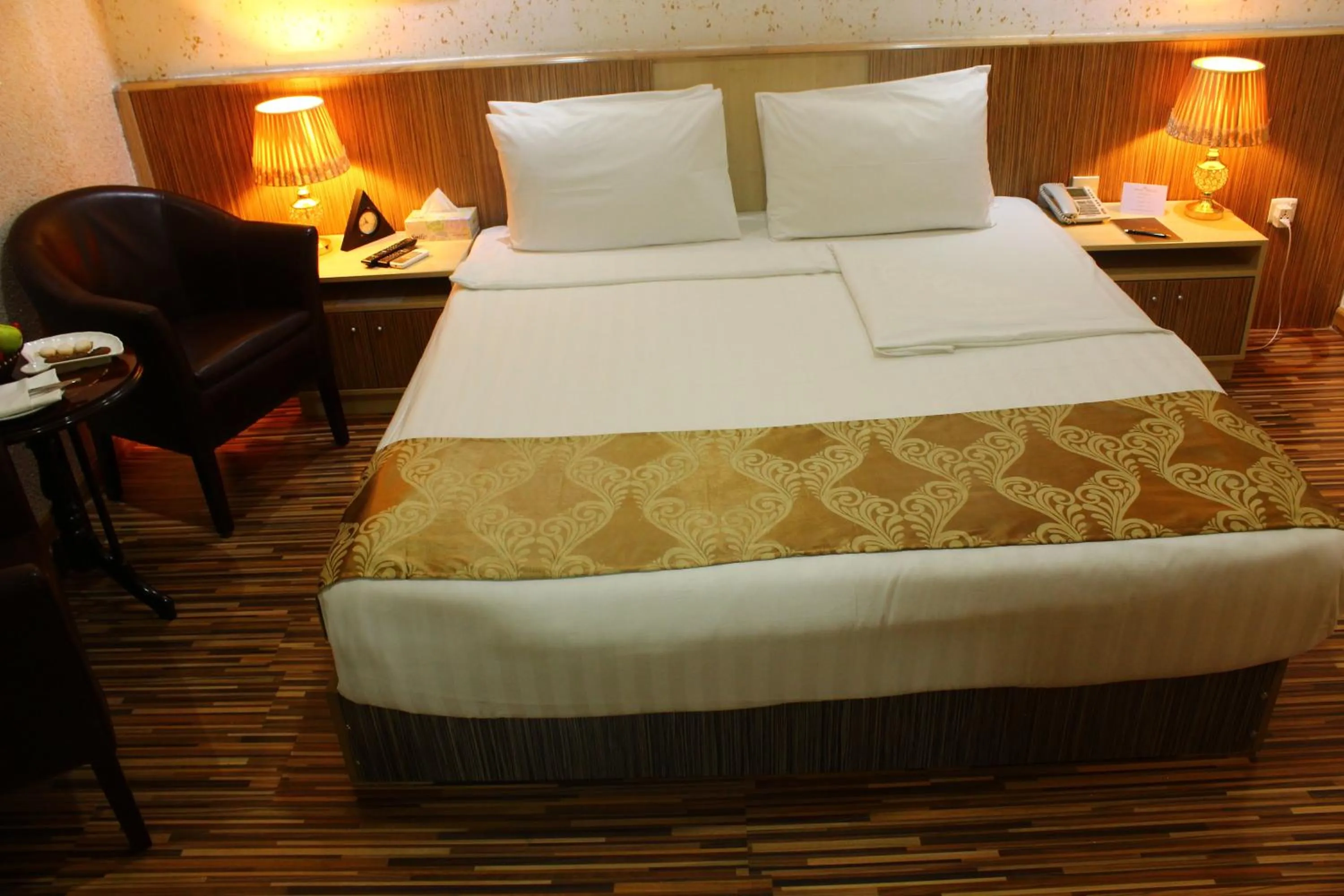 Bed in Palm Hotel