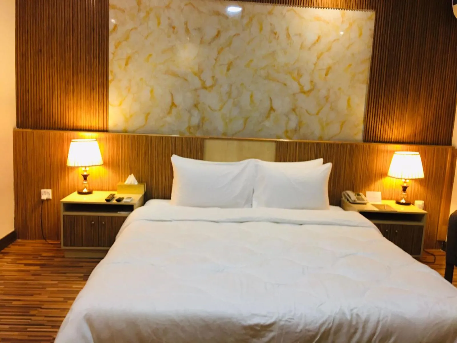 Bed in Palm Hotel