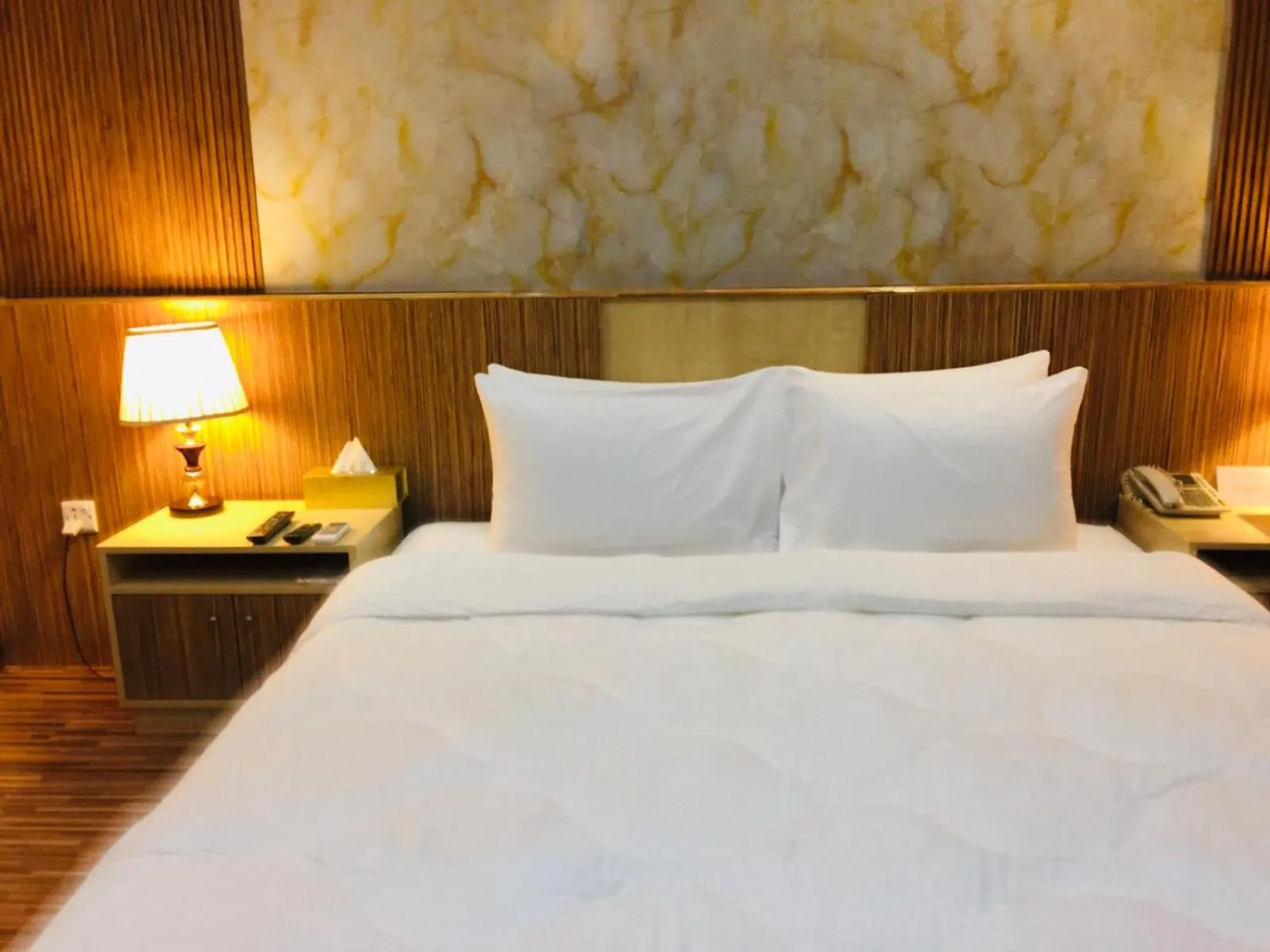 Bed in Palm Hotel