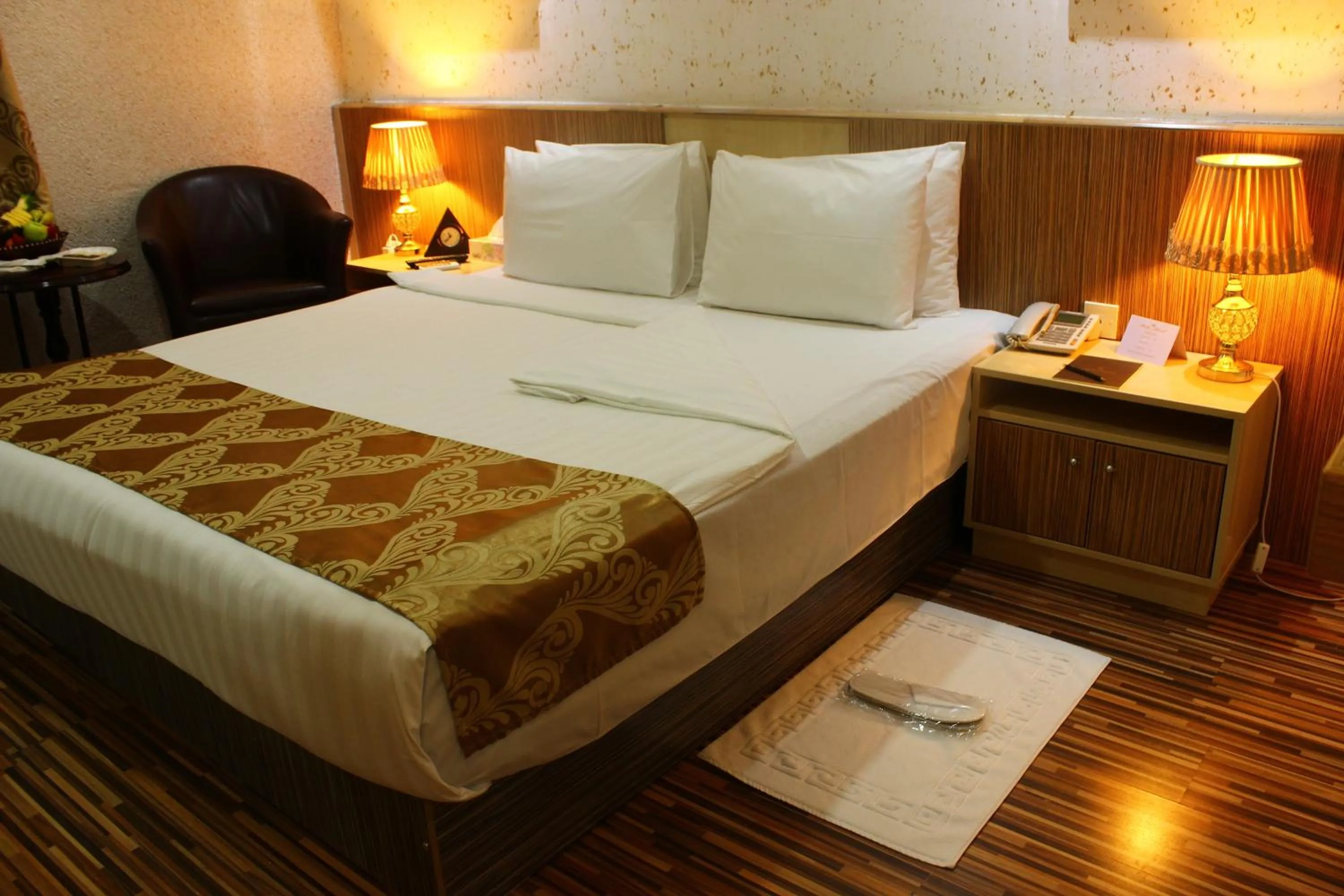 Bed in Palm Hotel