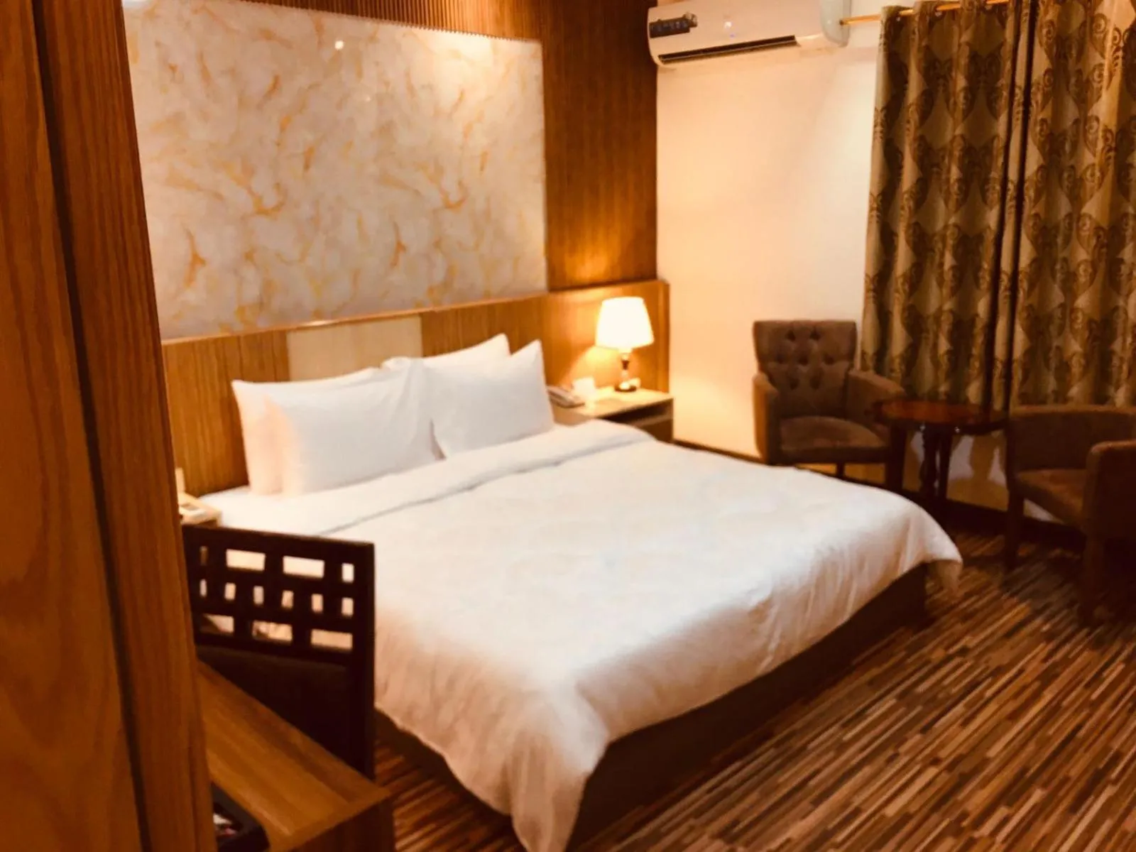Bed in Palm Hotel