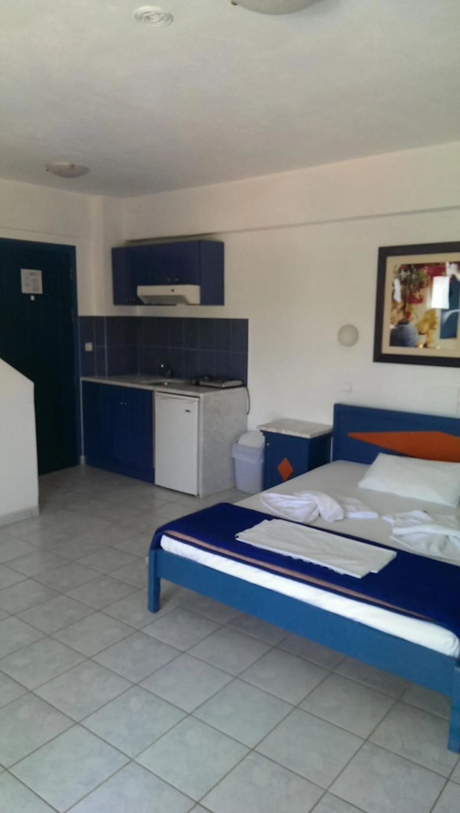 Kitchen or kitchenette, Bed in Leonidas Studios & Apartments