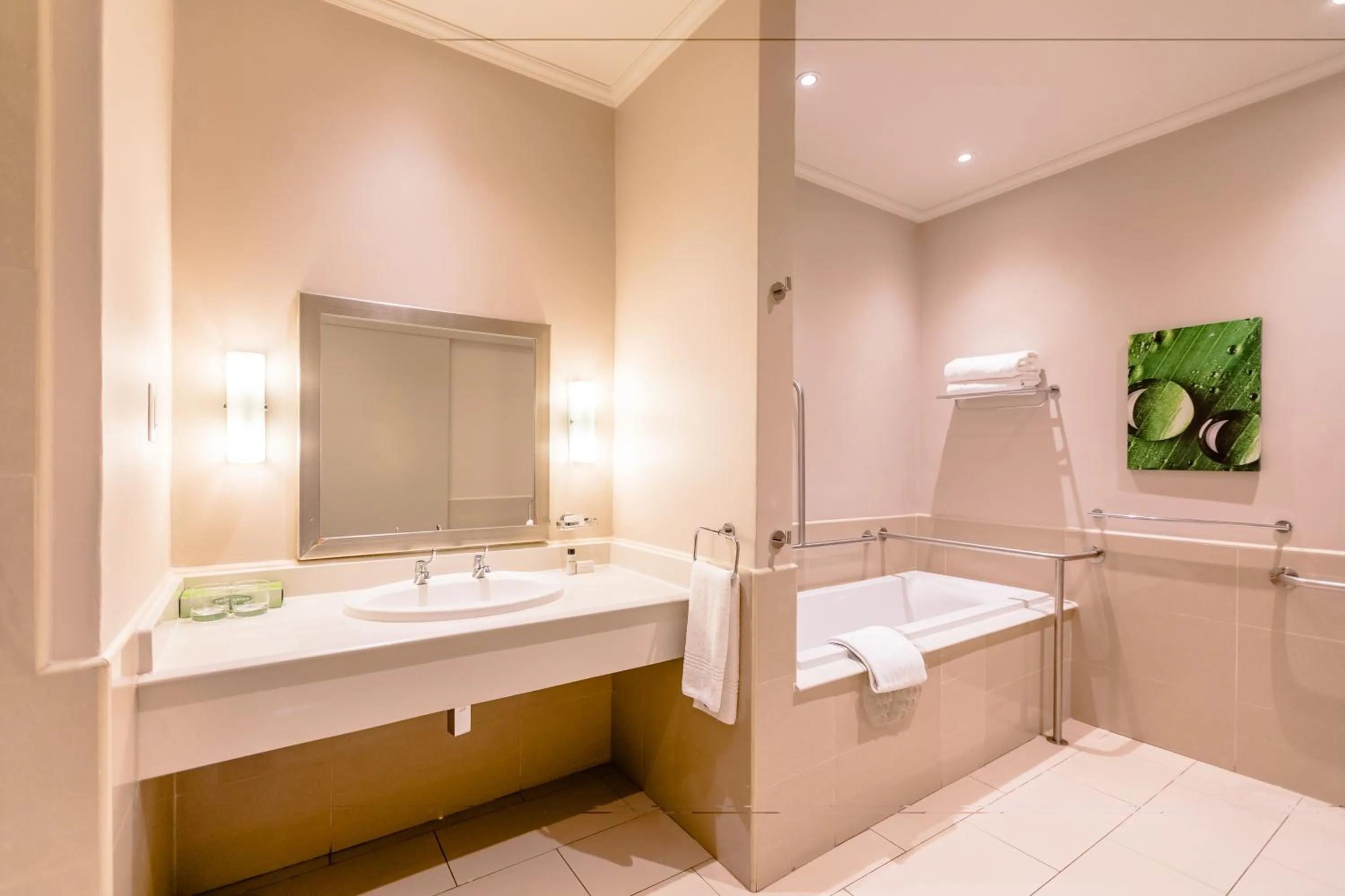 Bathroom, Bed in Gold Reef City Theme Park Hotel