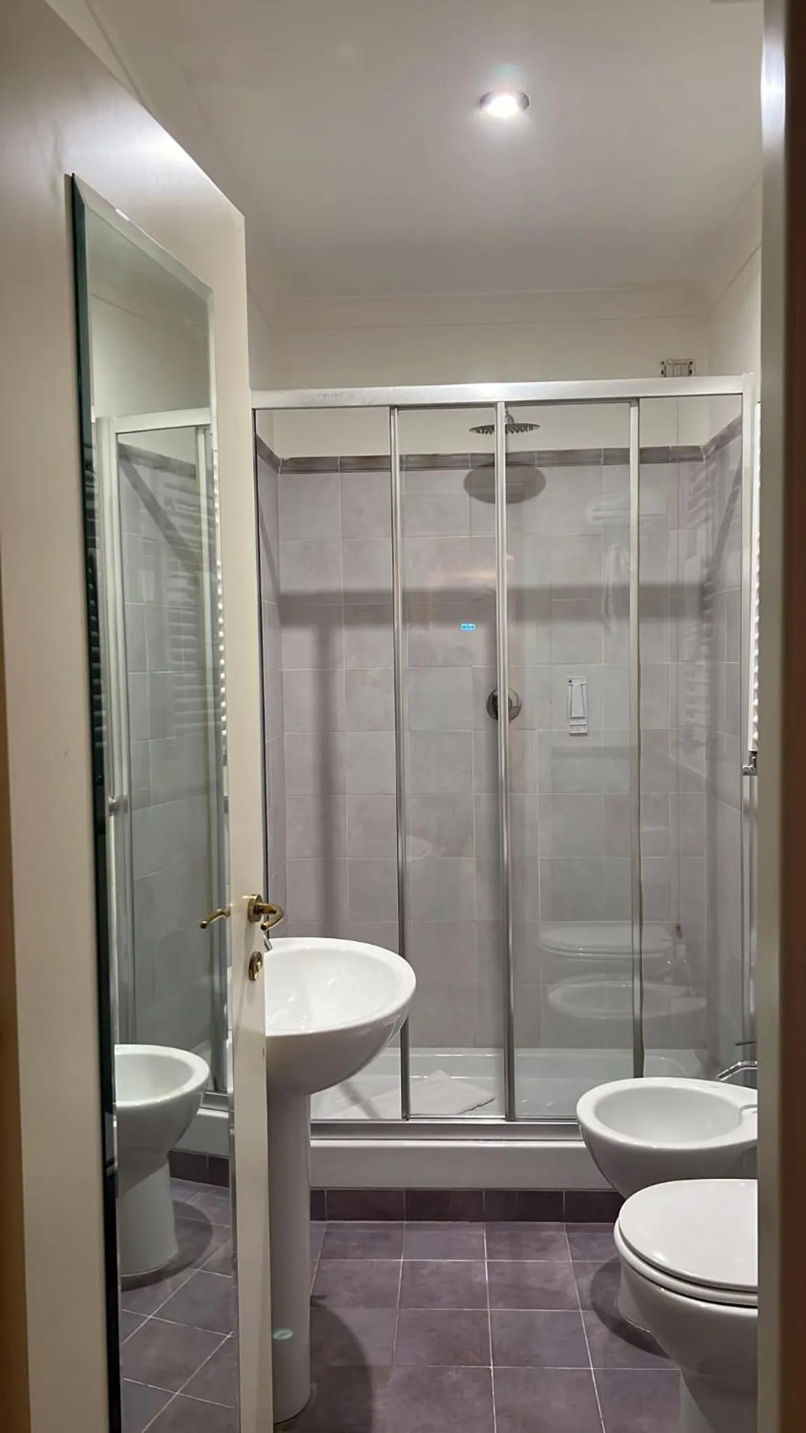 Bathroom in CANELLA HOTEL