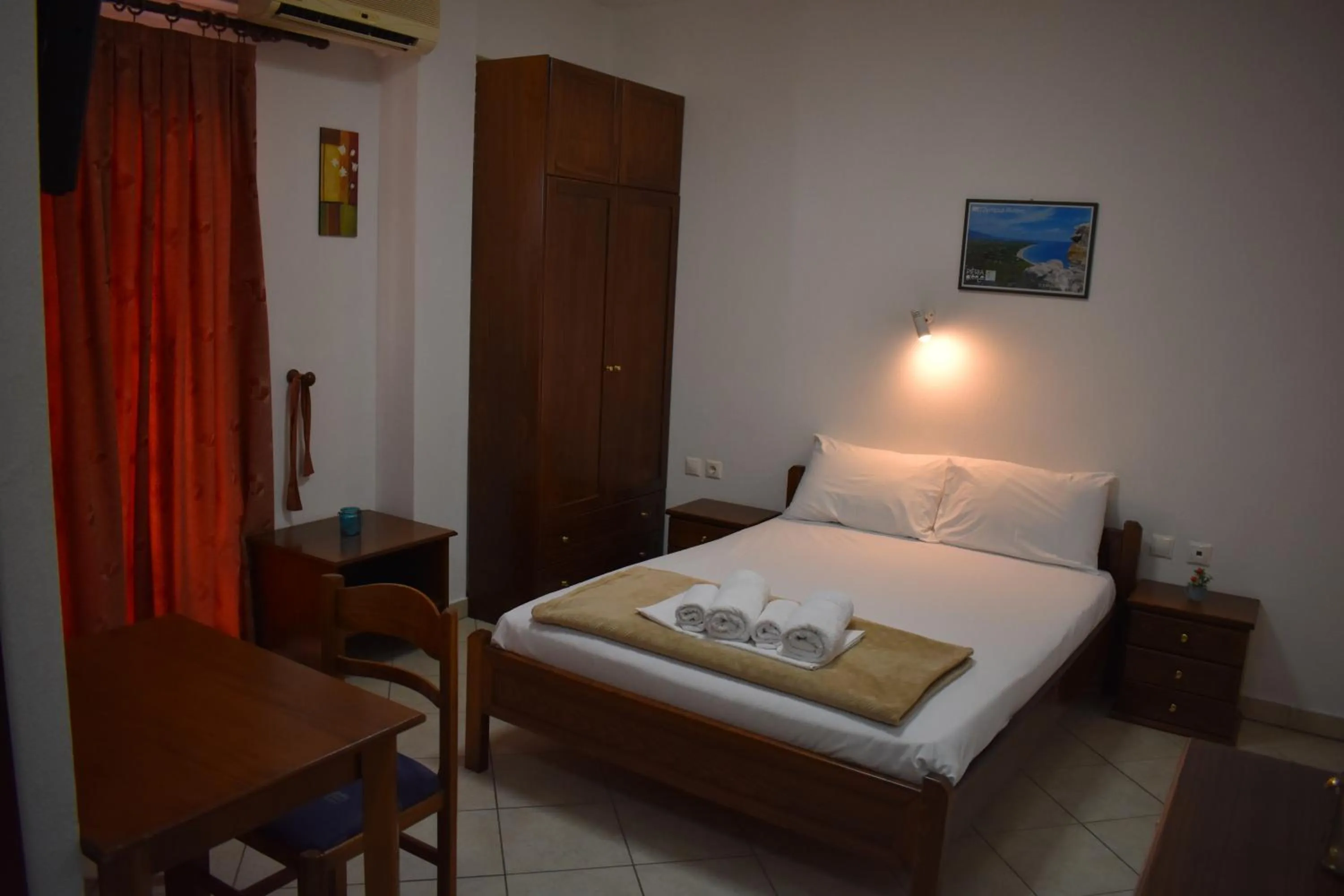 Bed in Galanis Studios and Apartments
