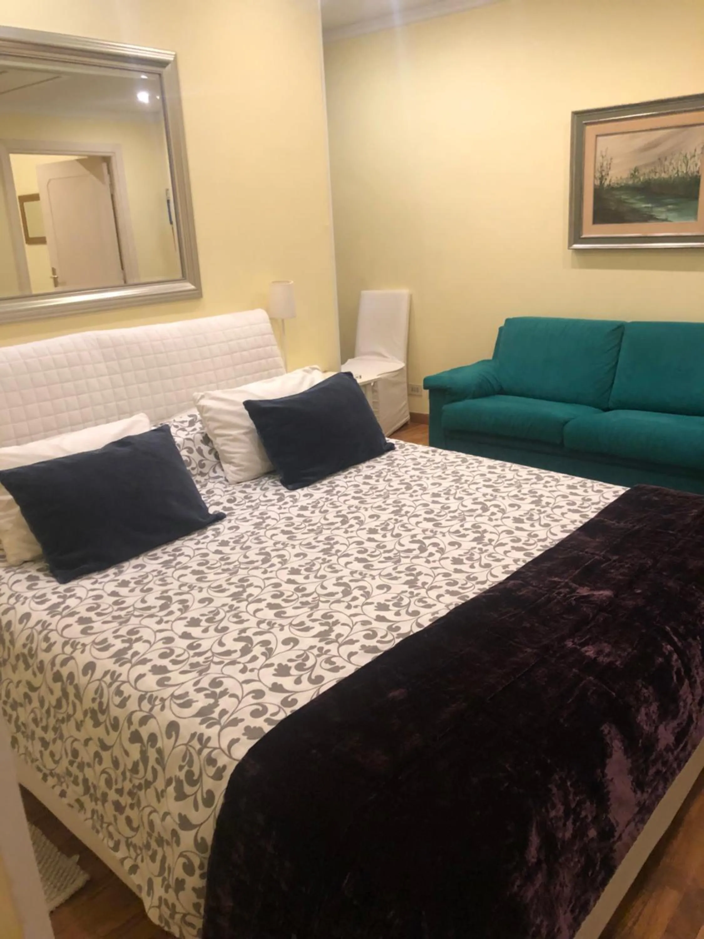 Bed in Aurora 31 - Suite & Breakfast