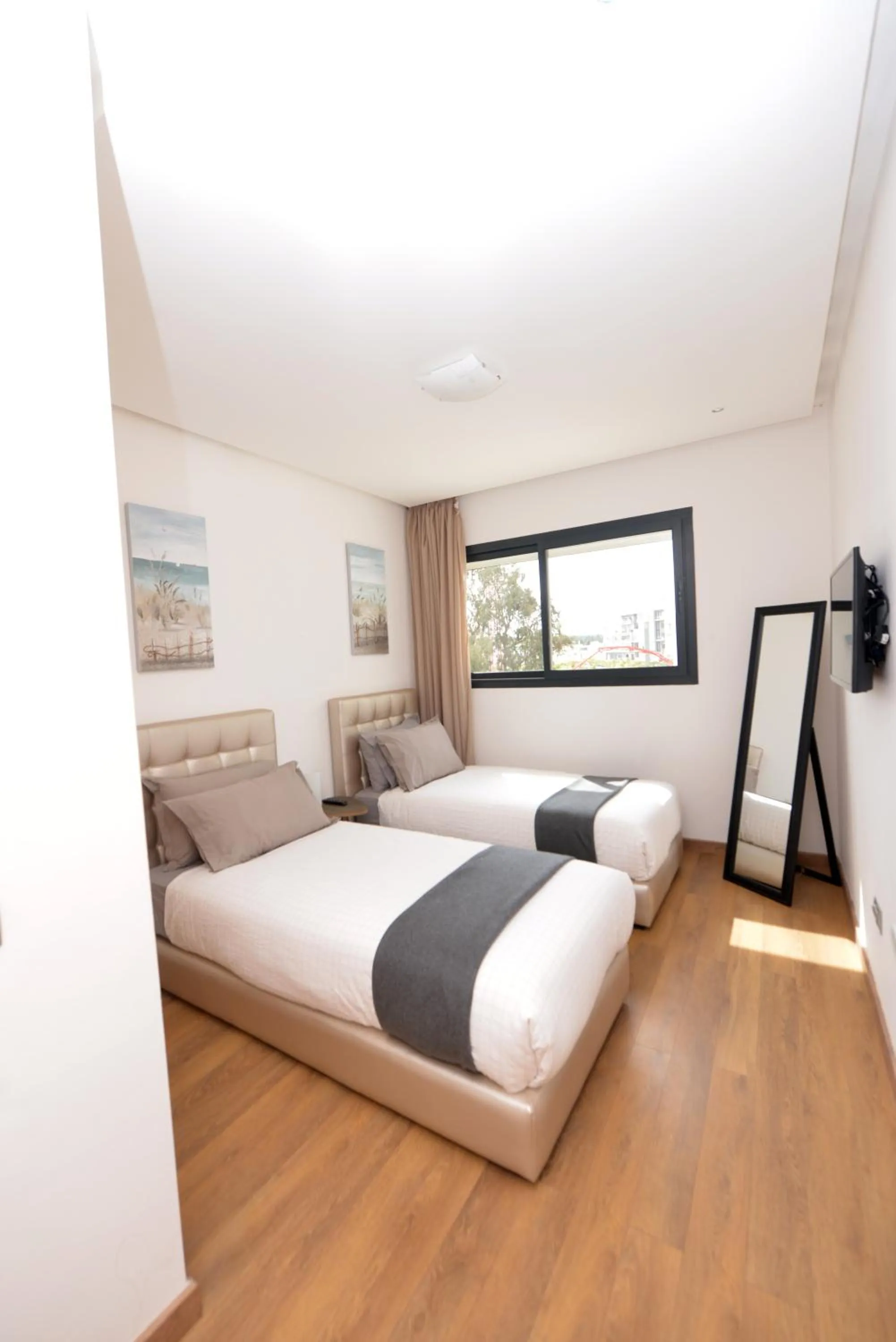 Bed in Prestigia Rabat Hay Riad Premium Apartments