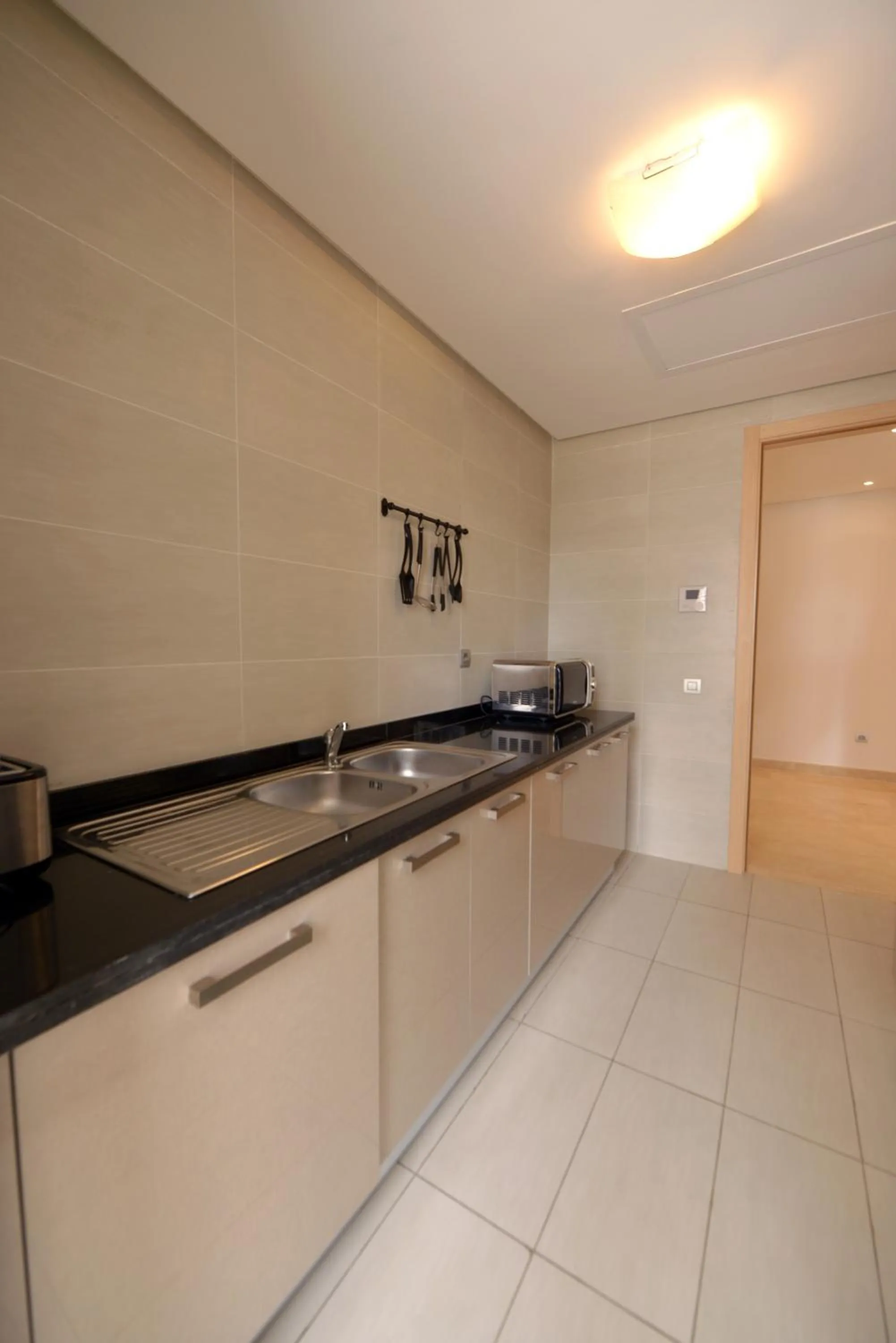 Kitchen or kitchenette in Prestigia Rabat Hay Riad Premium Apartments